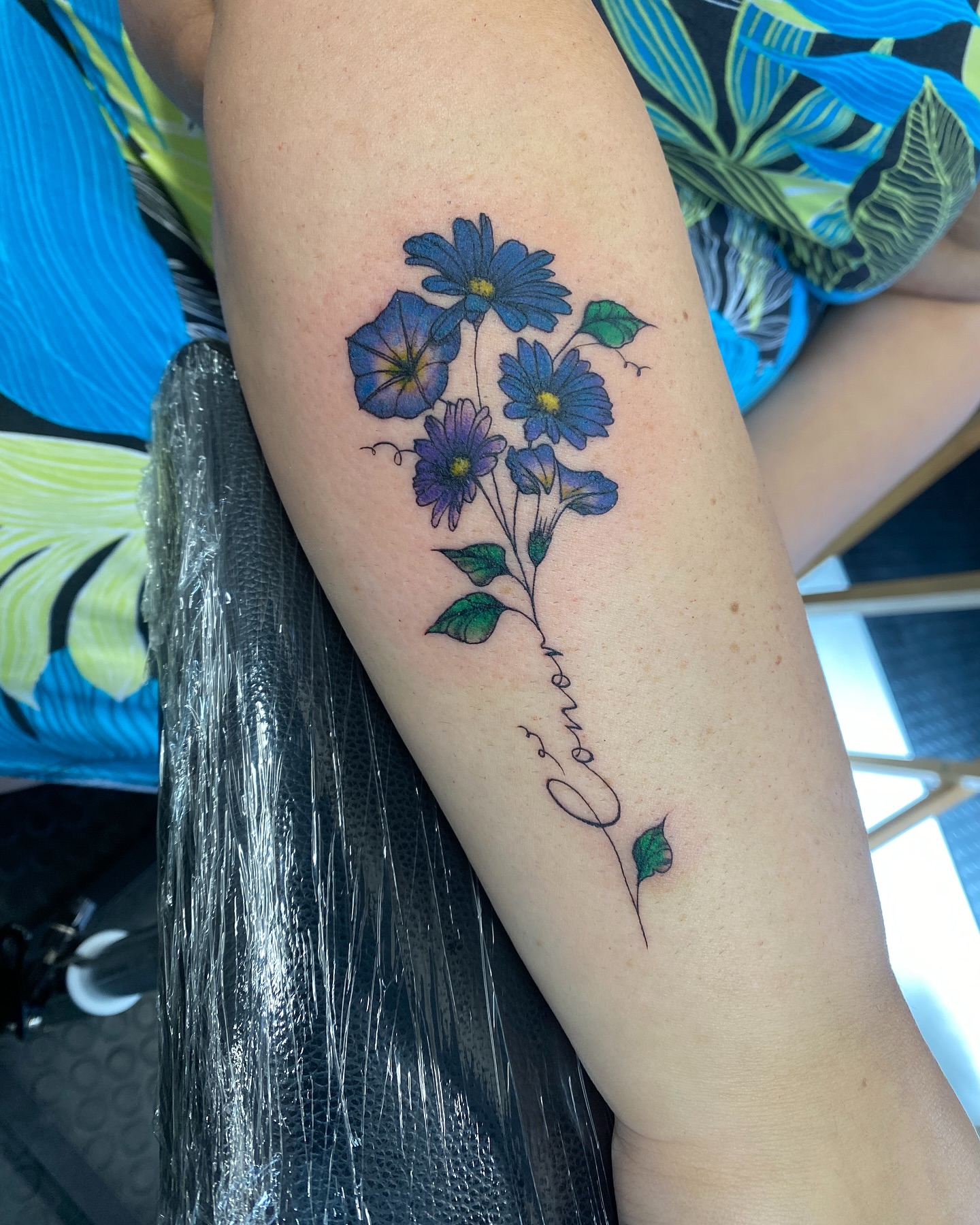 Flowers dotwork tattoo on the forearm by Ellena Reggiani