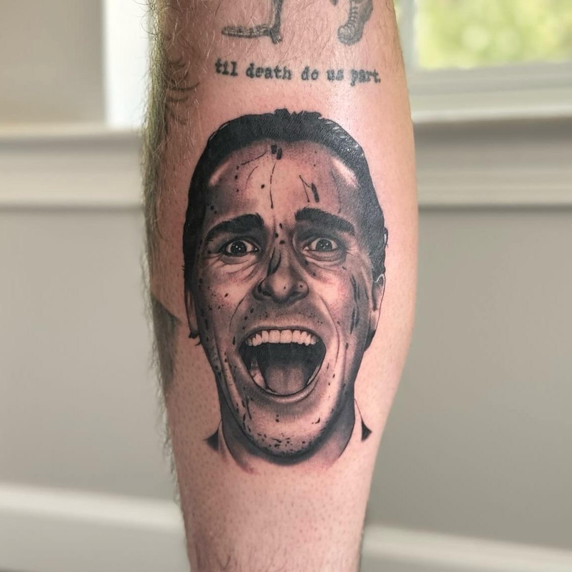 Angry man realism tattoo on the forearm by Bill Johenning, Lakewood, Ohio