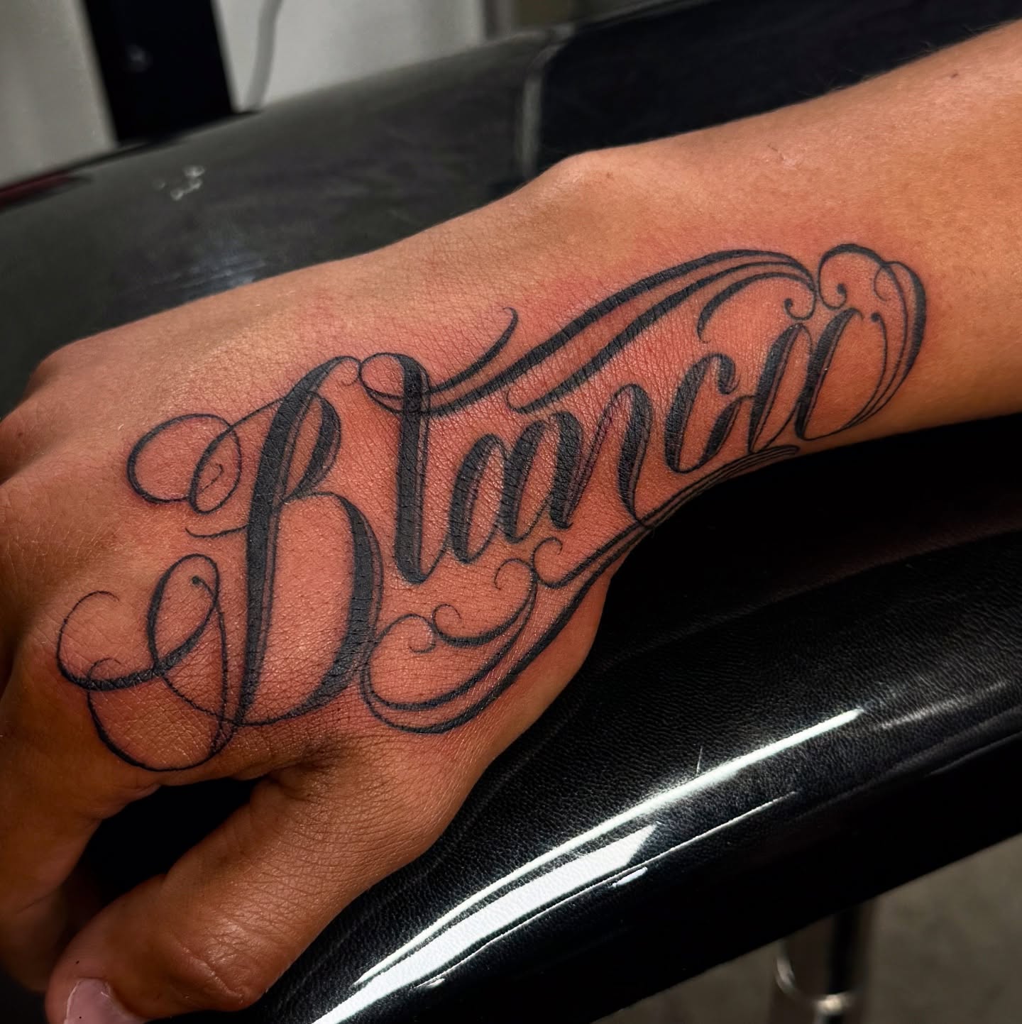 Script lettering lettering script tattoo on the hand by Anthony Duran