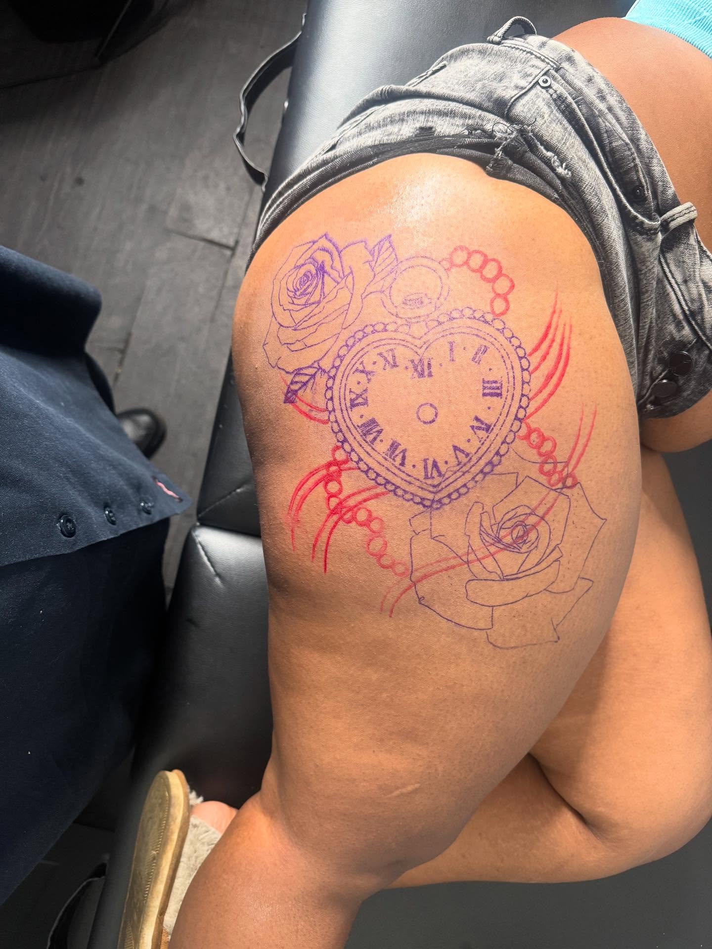 Heart clock with roses American traditional tattoo on the thigh by Tattoosbydevon
