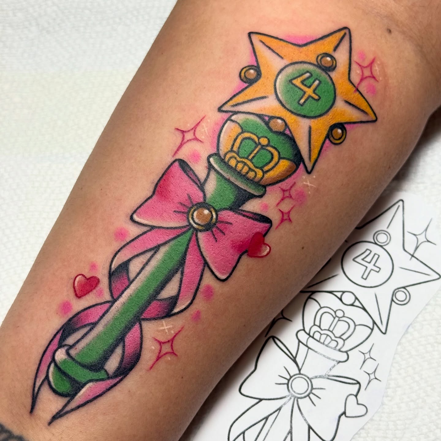 Magic wand new school tattoo on the forearm by vic