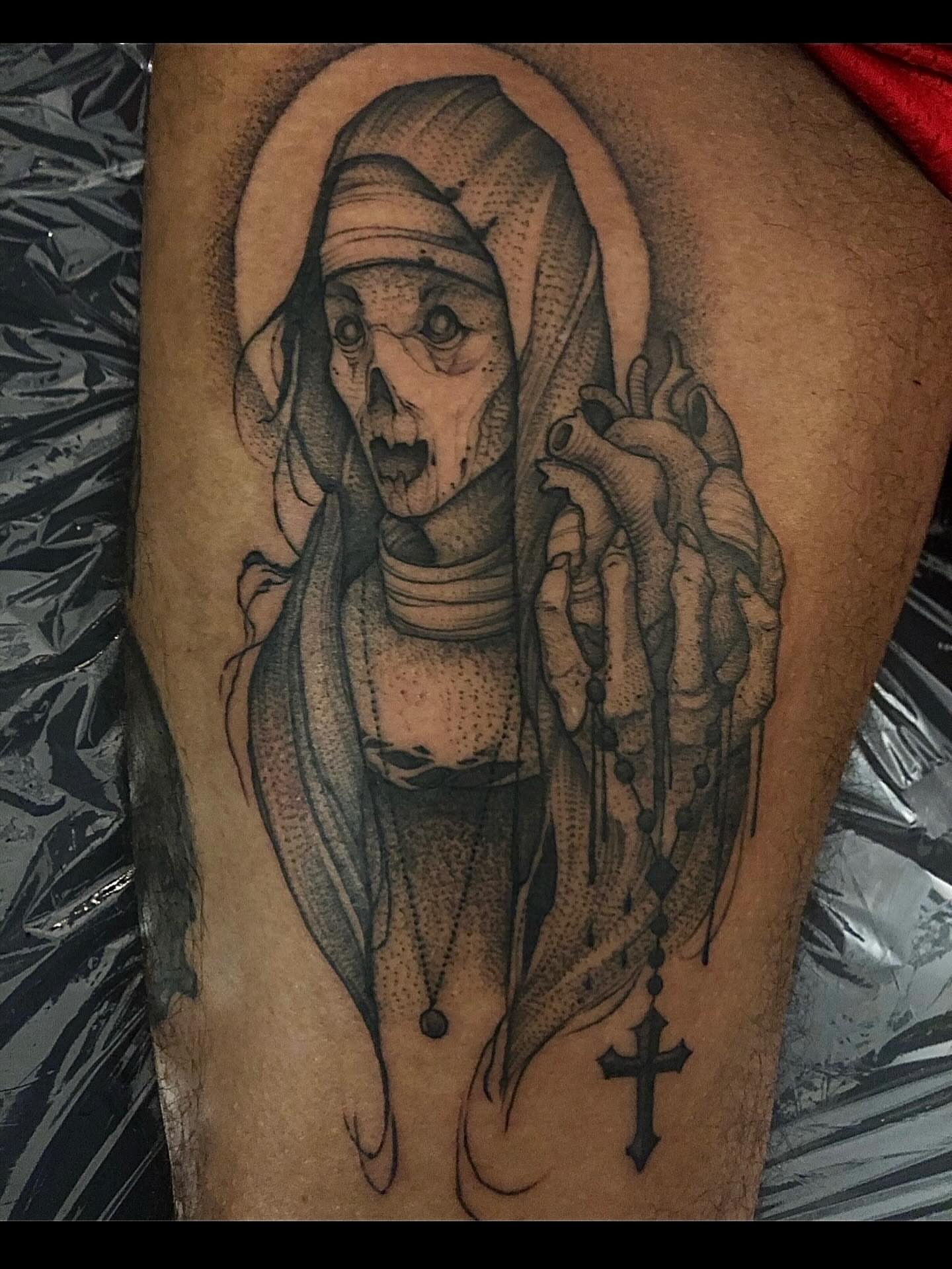 Skeleton nun realism tattoo on the thigh by Jacob Kearney