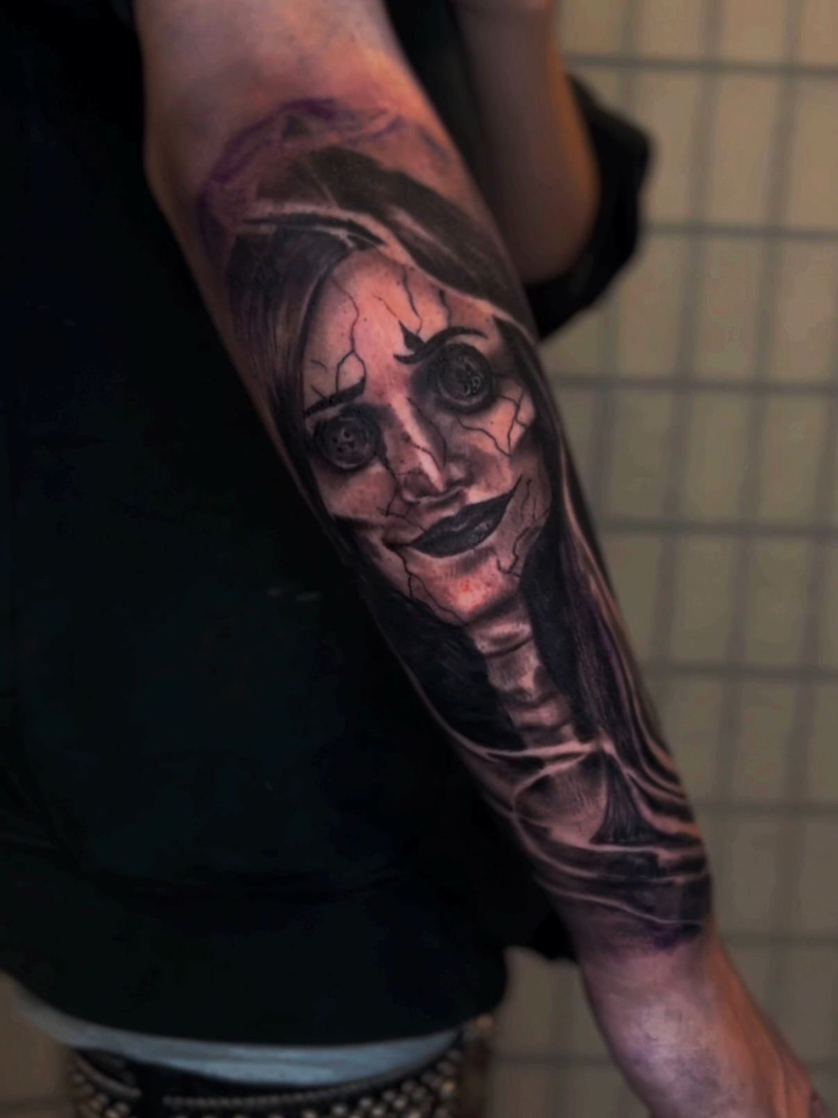 Woman's face realism tattoo on the forearm by C.J. Rued