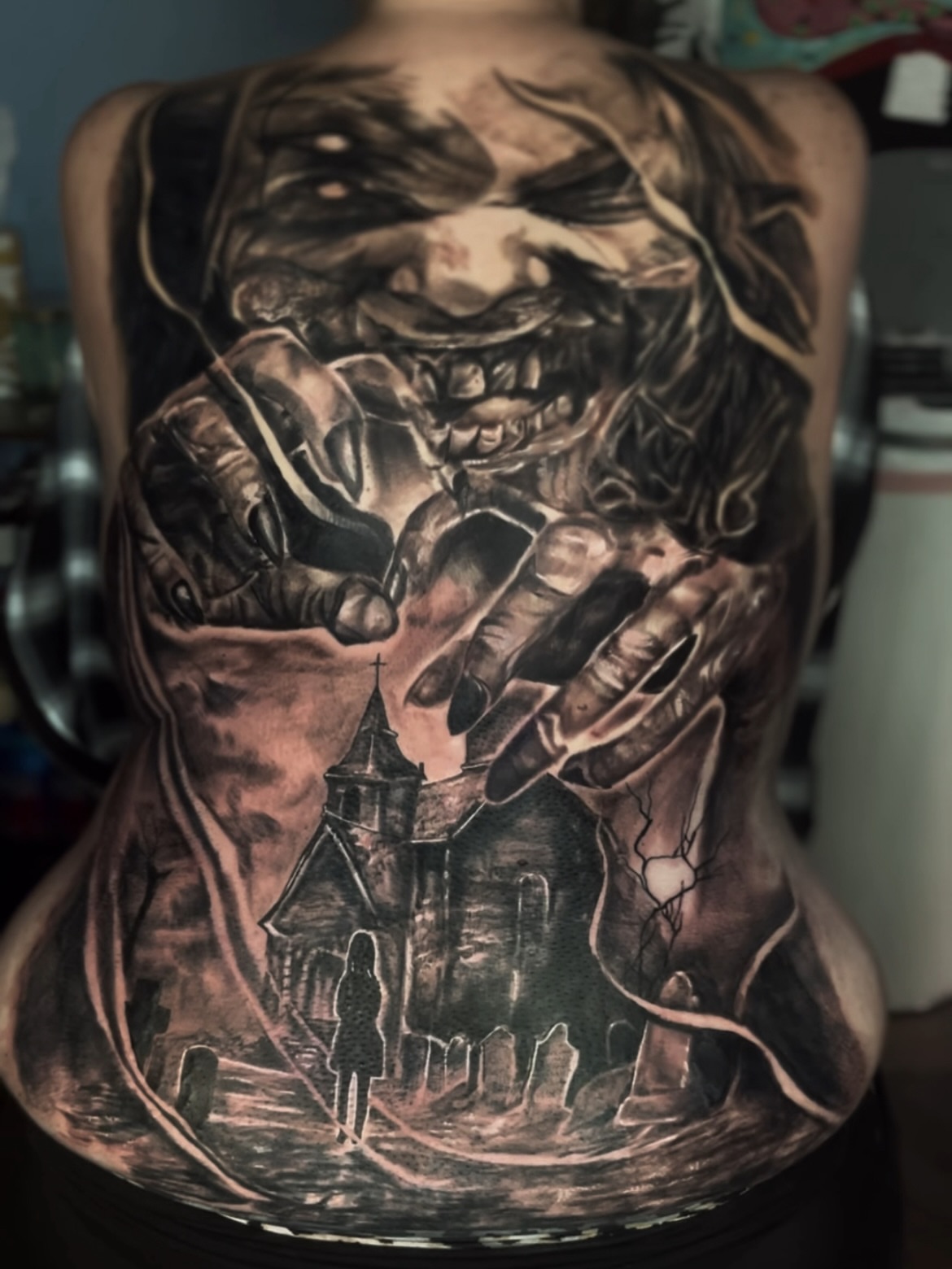 Horror scene dark realism tattoo on the torso by C.J. Rued