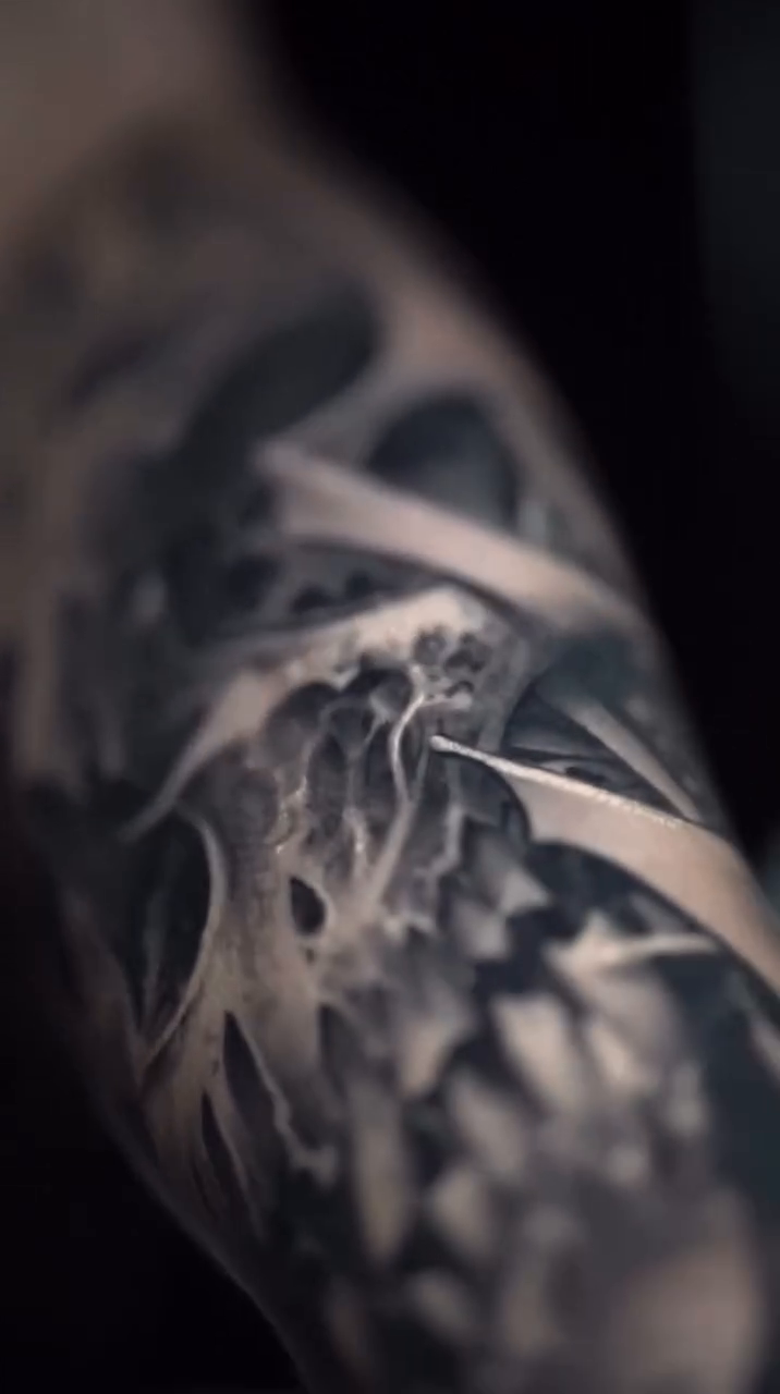 Skull with mechanical elements dark realism tattoo by Victor Portugal Tattoo