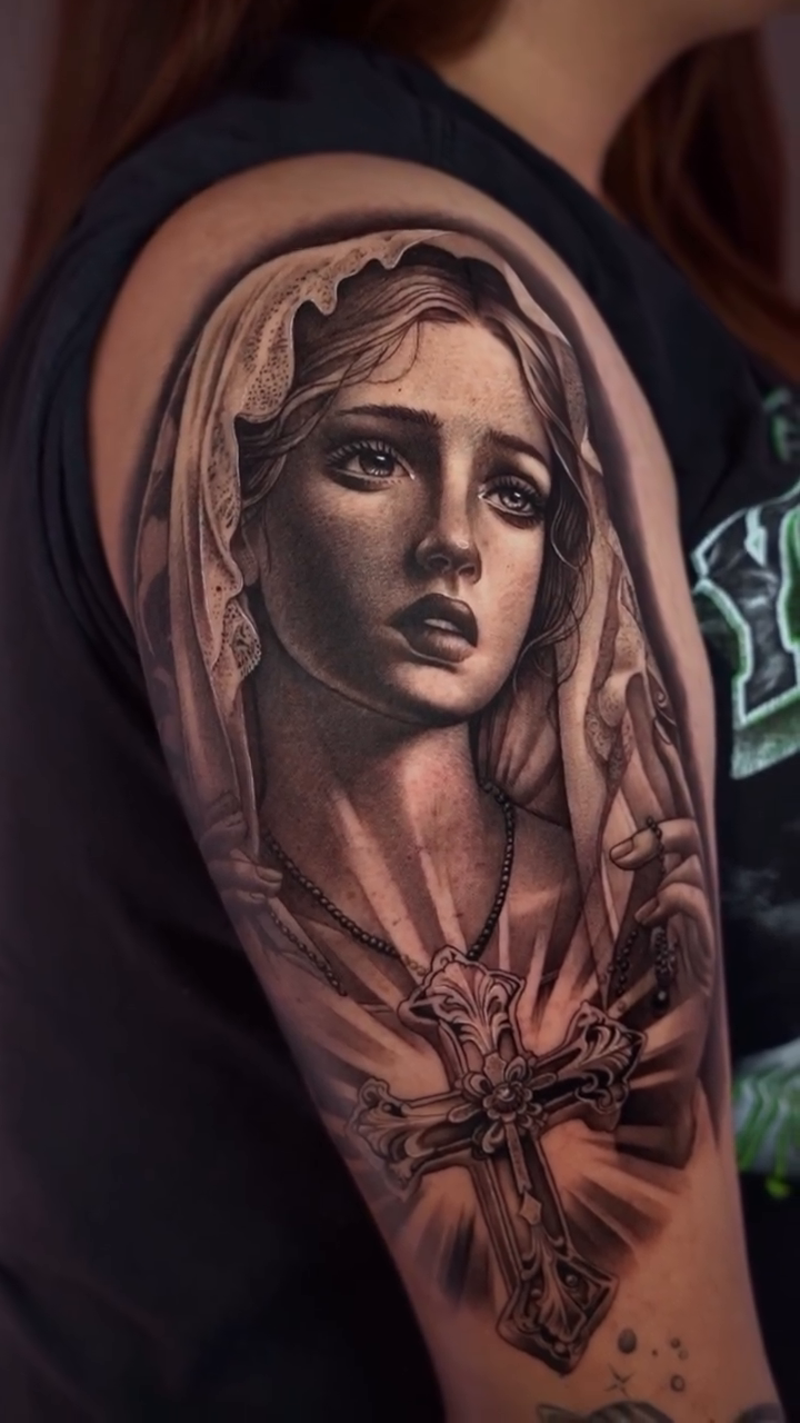 Virgin Mary with cross realism tattoo by Risa