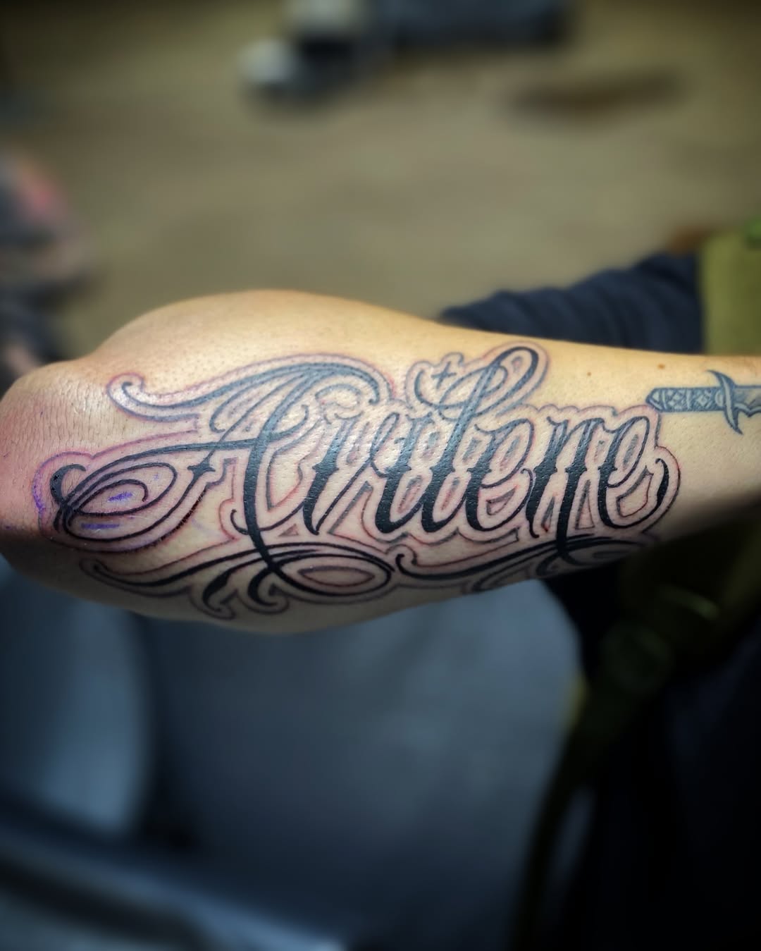 Tattoo by @josh_st_tat2 — lettering_script, chicano