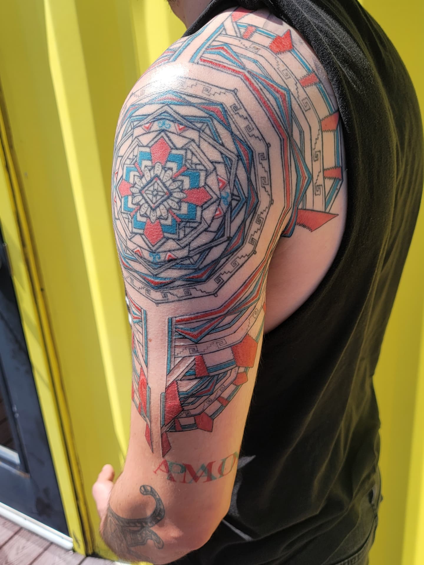 Geometric mandala geometric tattoo on the upper arm by Keith Countryman, Fort Worth, Texas