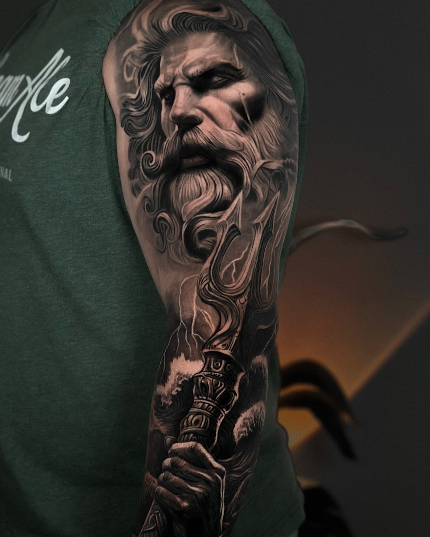 Bearded man with sword realism tattoo on the upper arm by Nathan, Charlotte, North Carolina