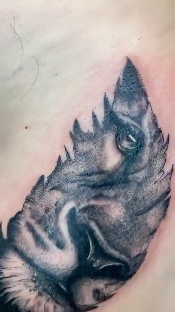 Wolf face realism tattoo by Blot_Tattoo