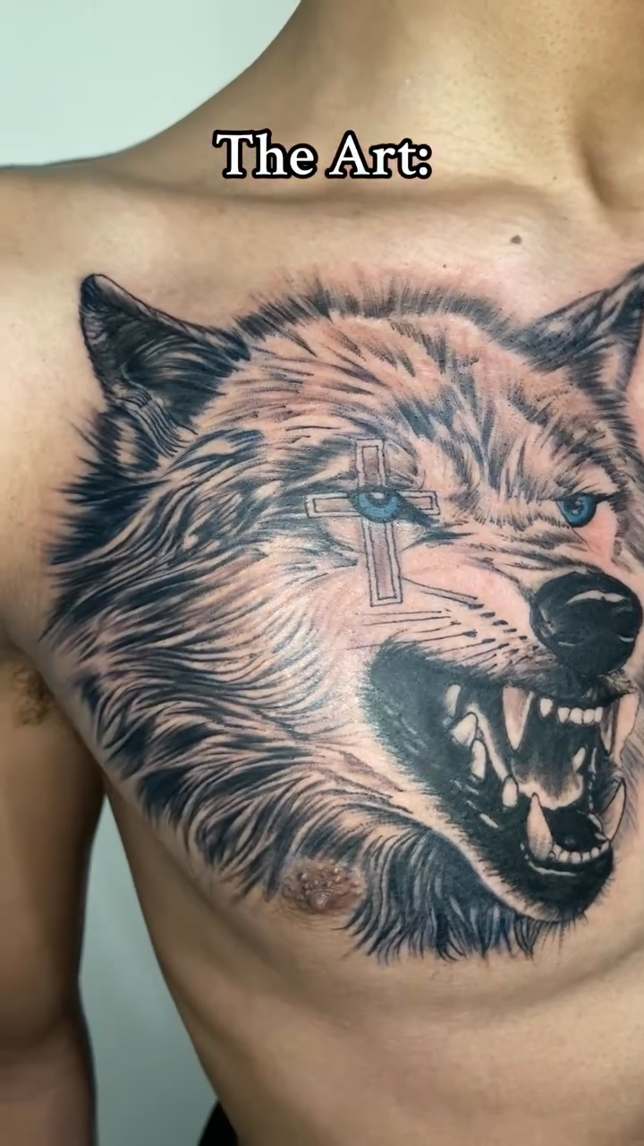 Wolf head realism tattoo on the chest by Adrian Ram 🇬🇾🇵🇭