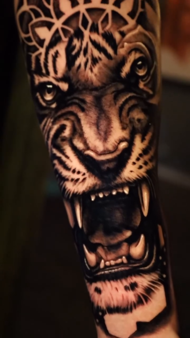 Tiger head with mandala realism tattoo by Bryan Palacios