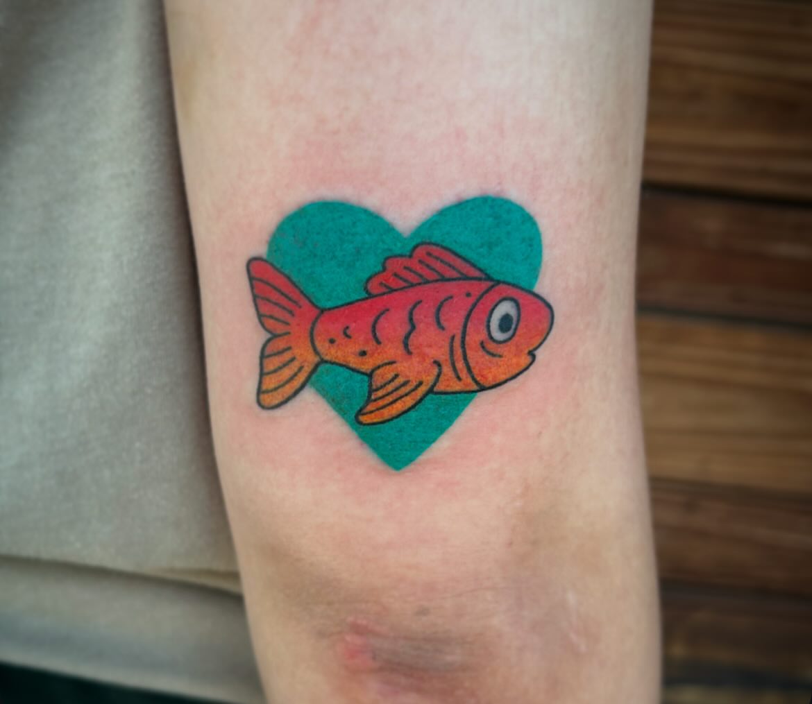 Goldfish dotwork tattoo on the forearm by Kayla Shoffner
