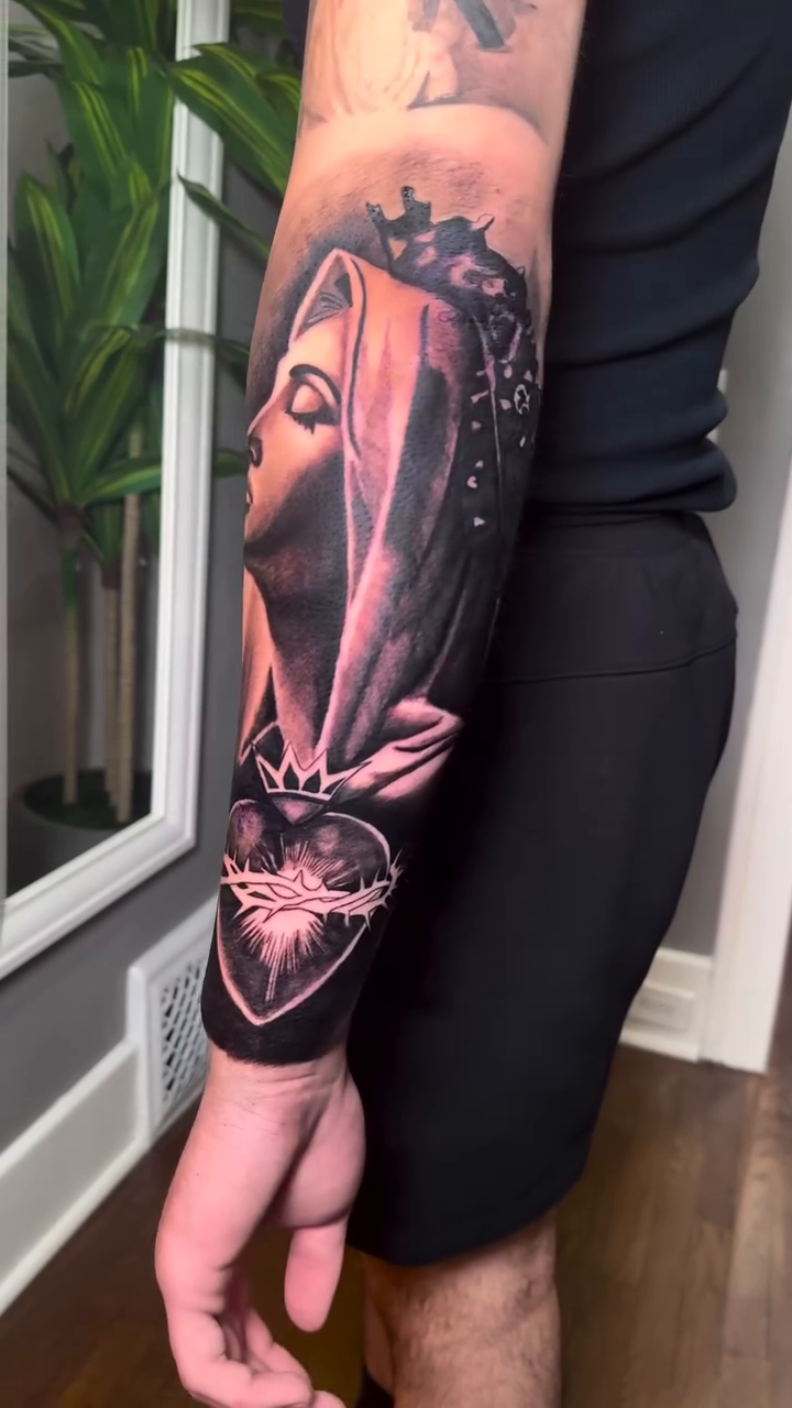 Virgin Mary with Sacred Heart realism tattoo by caleb coley