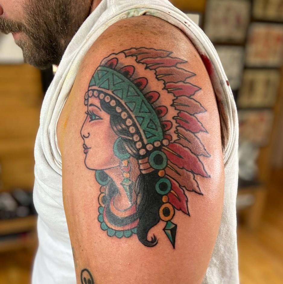 Indian headdress American traditional tattoo on the shoulder by Eric James, Columbus, Ohio