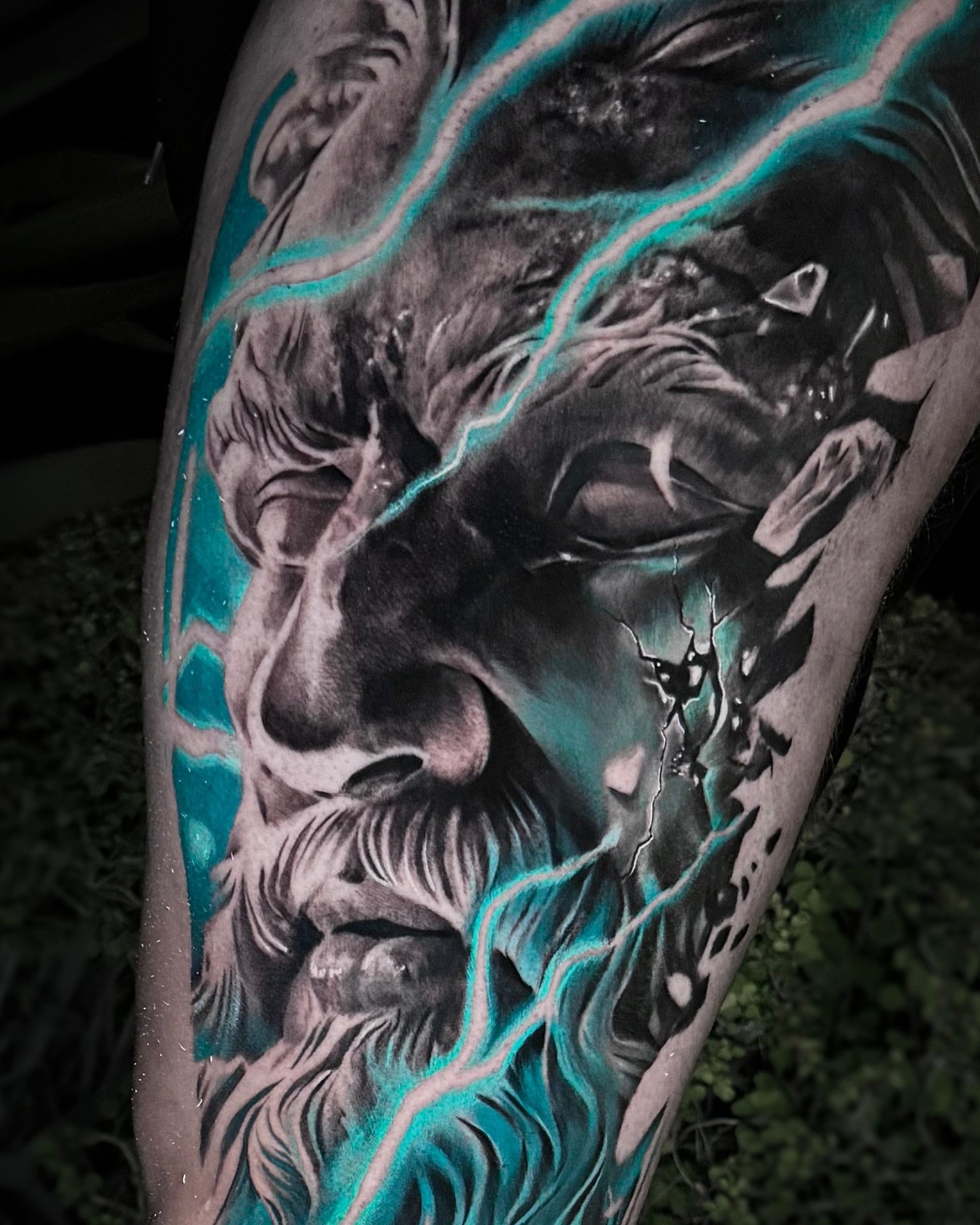 God-like face realism tattoo on the forearm by Juan Pablo Molina