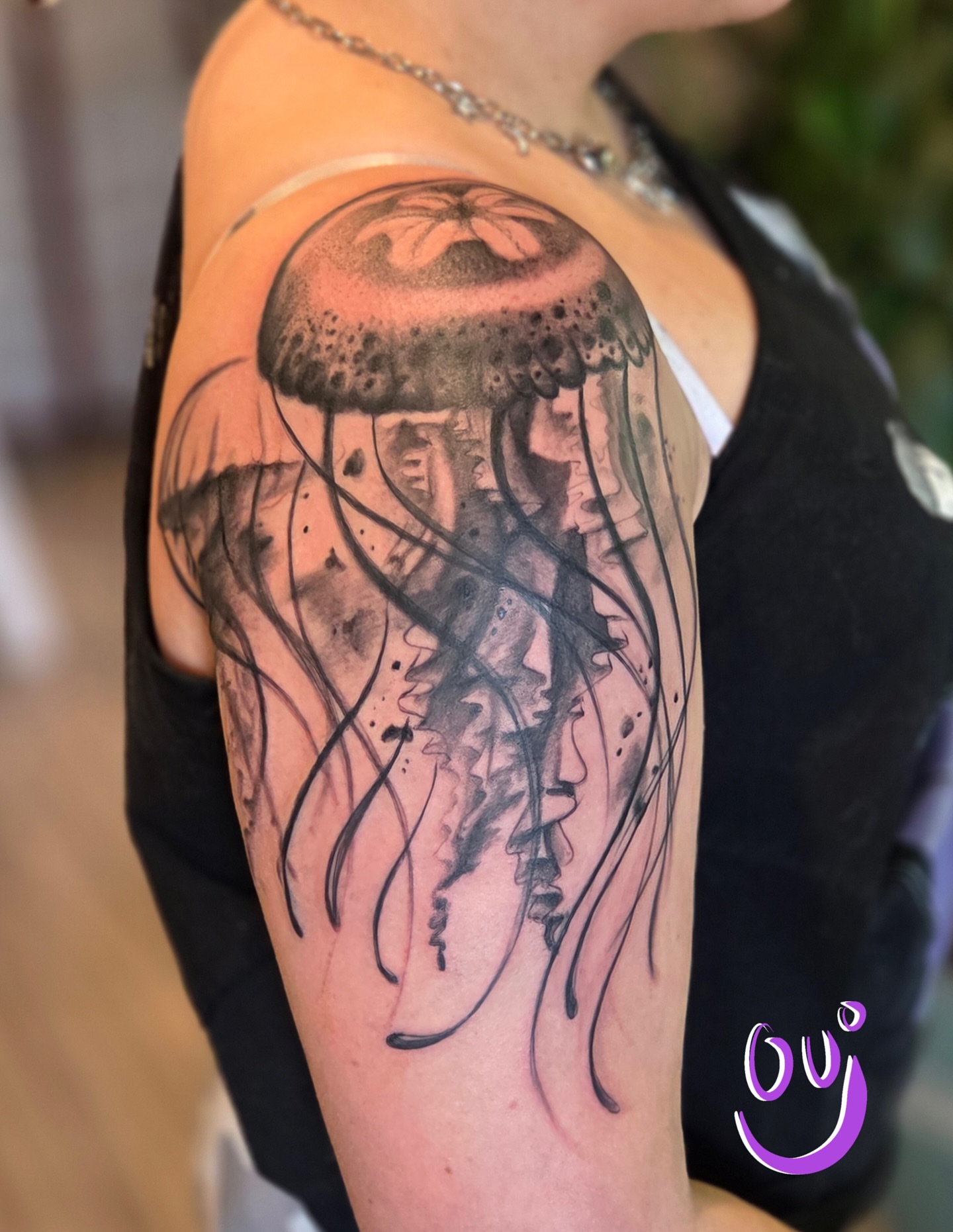 Jellyfish realism tattoo on the upper arm by Jou Smile (Jo)