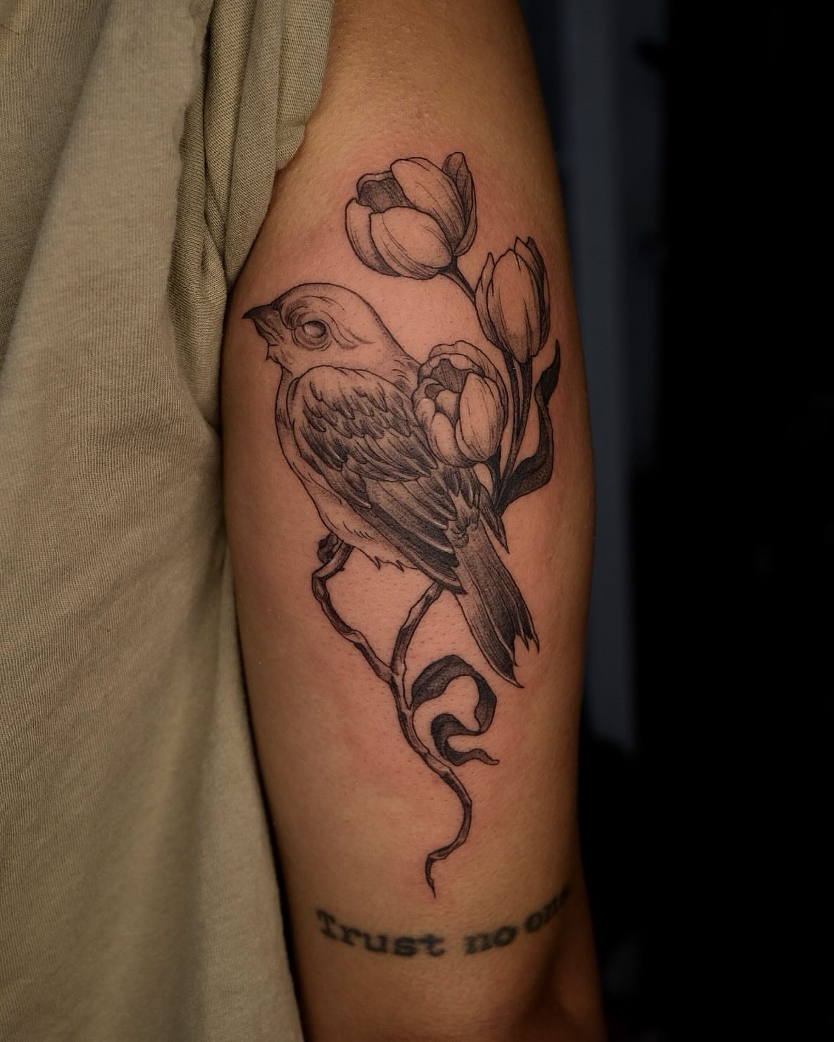 Bird and tulips black and grey tattoo on the forearm by misa (mi isabelle) β€οΈβπ₯π