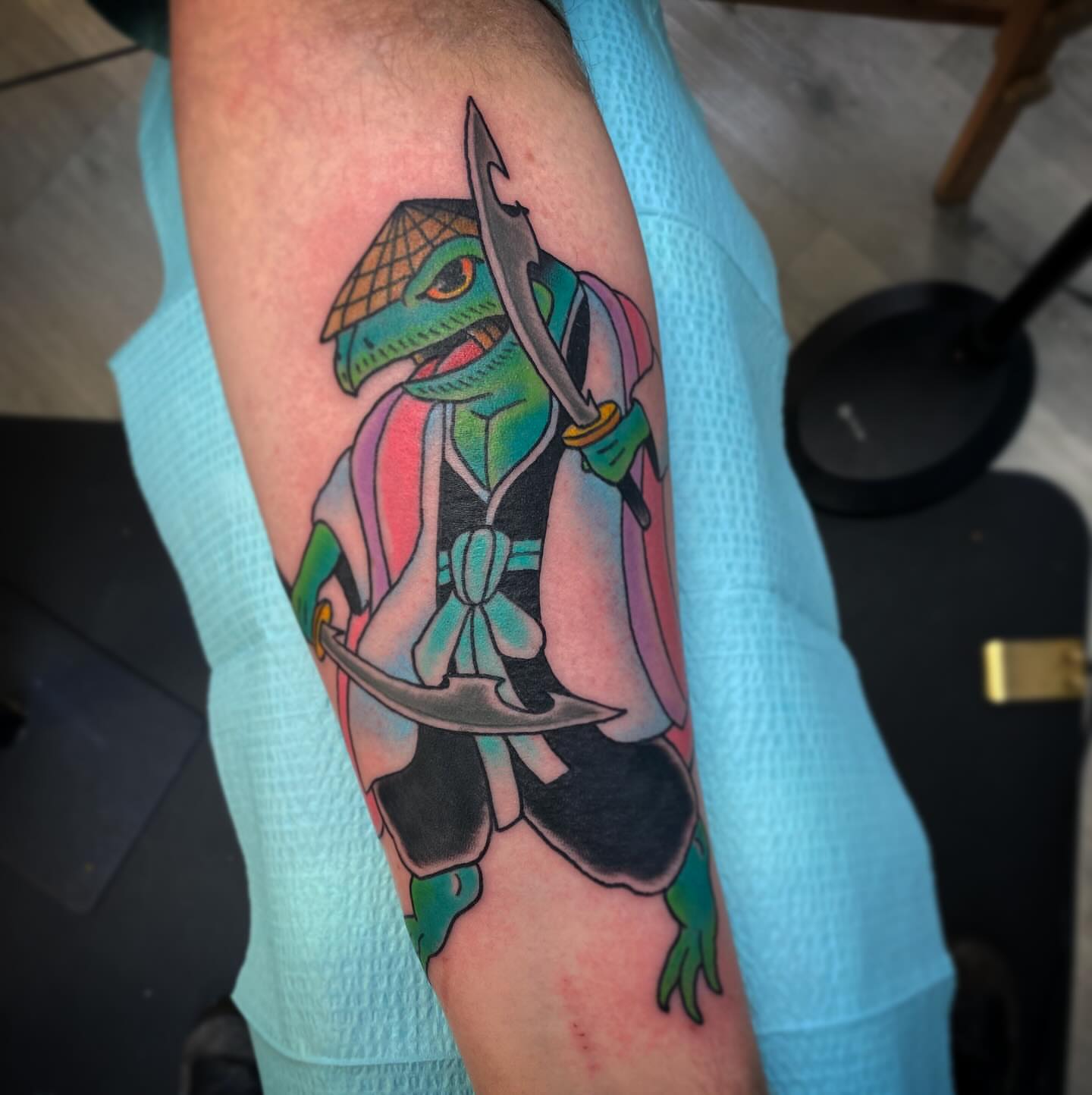 Lizard warrior geometric tattoo on the forearm by Kyle Mitchell, Cincinnati