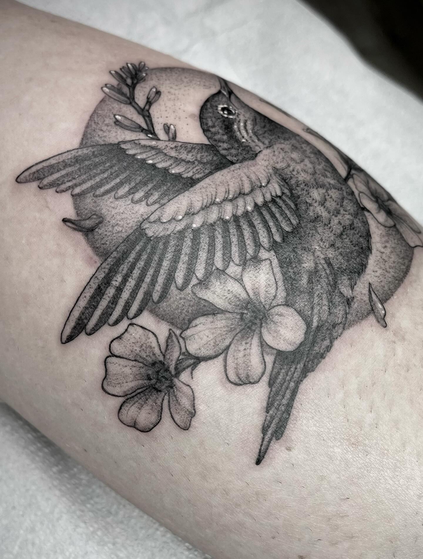 Bird and flowers realism tattoo on the forearm by Martha Gual π€ East ATX Tattooer