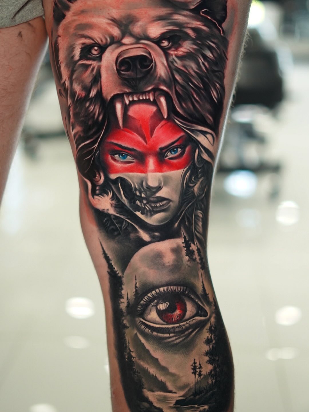 Bear, woman, eye realism tattoo on the thigh by Angel Perez