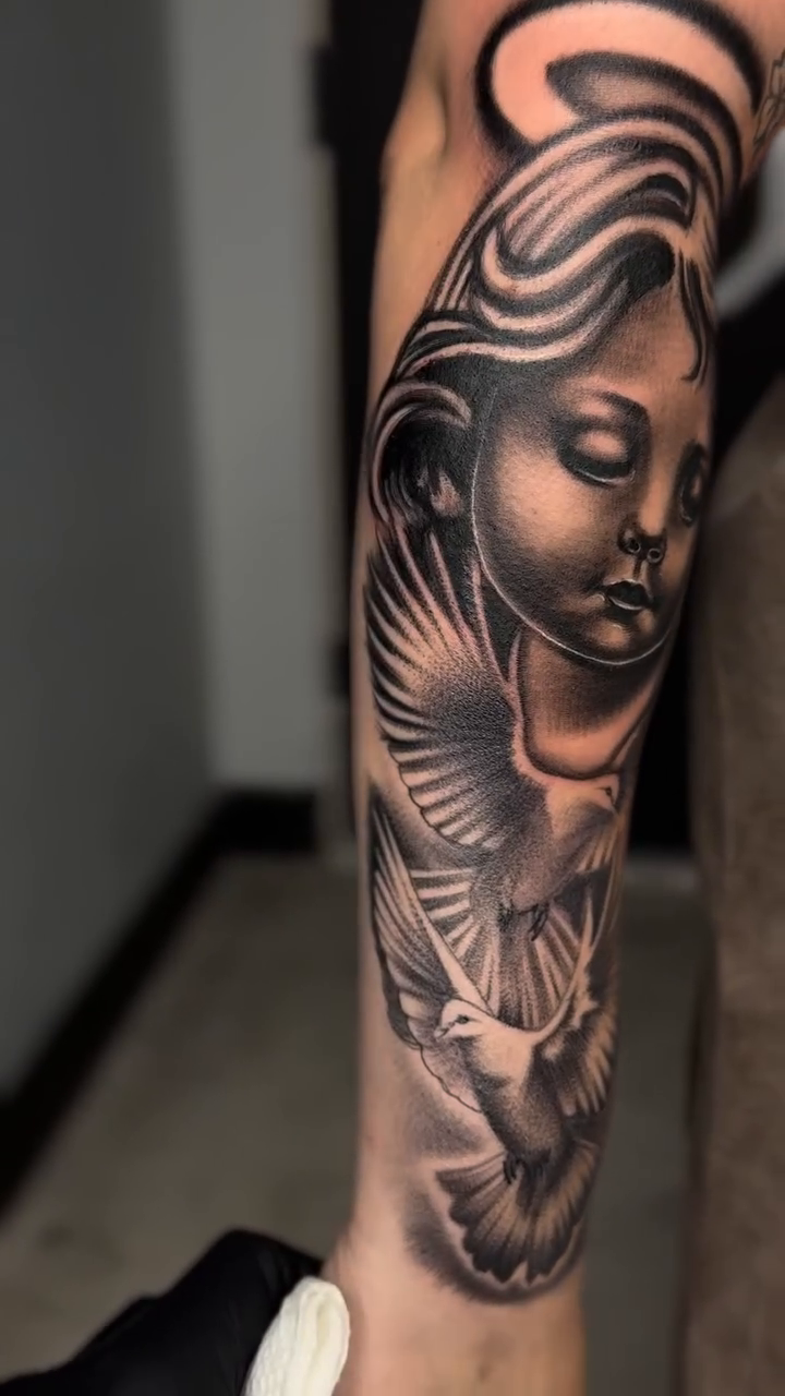 Angel and doves realism tattoo by Alex Romero