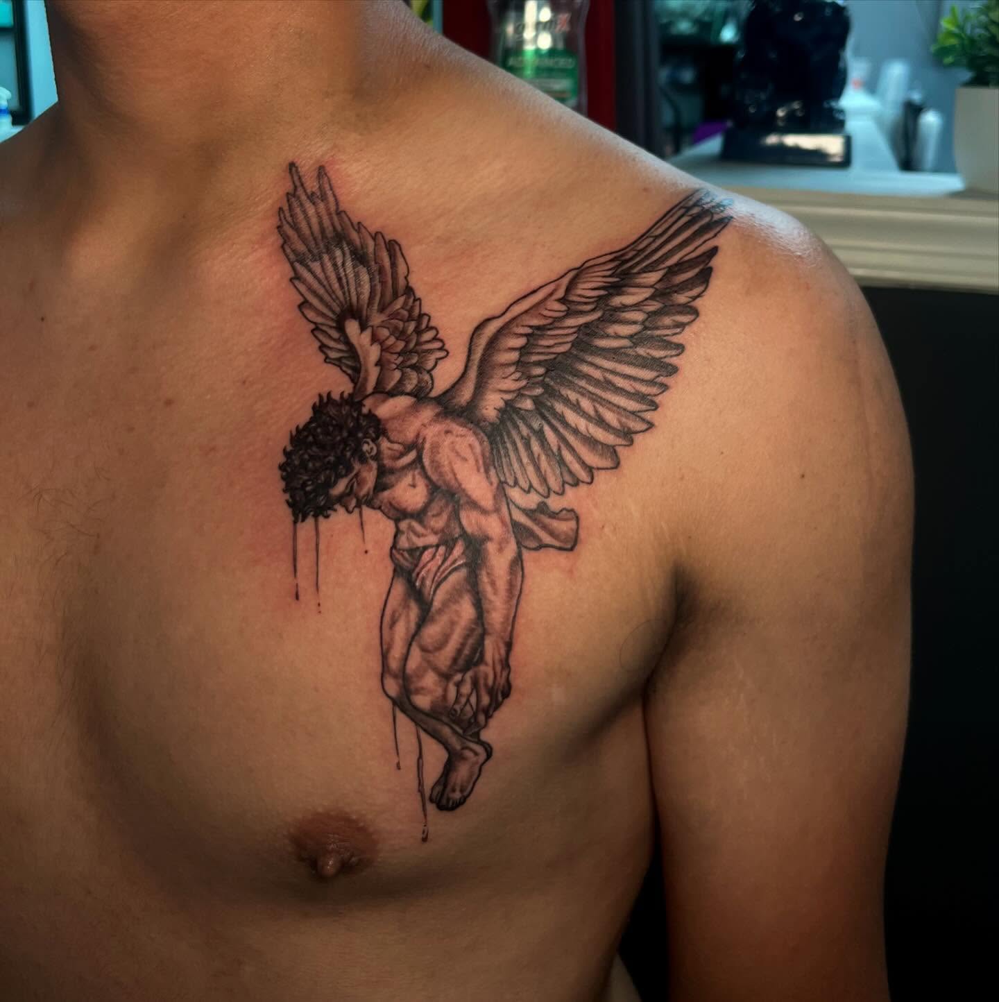 Angel with wings black and grey tattoo on the chest by Ciera (Ribbit) ๐ธ