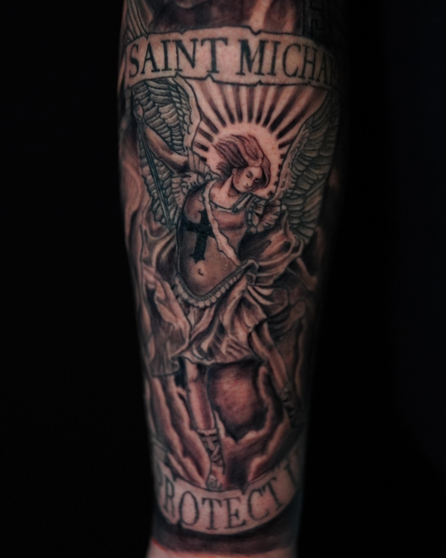St. michael realism tattoo on the forearm by @tattoobytats