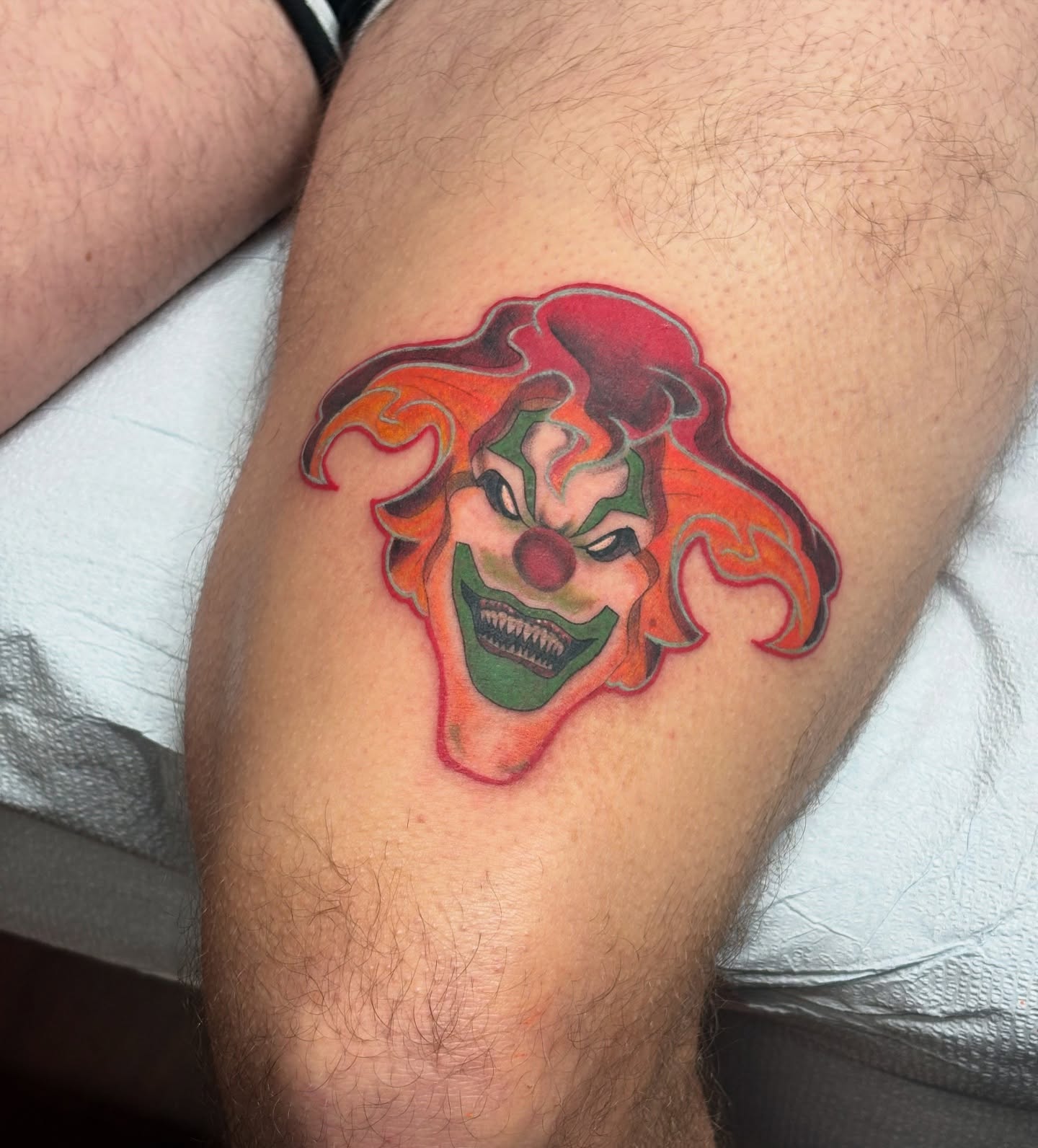 Clown face realism tattoo on the thigh by ✨Dani Jackson✨, New Orleans, Louisiana