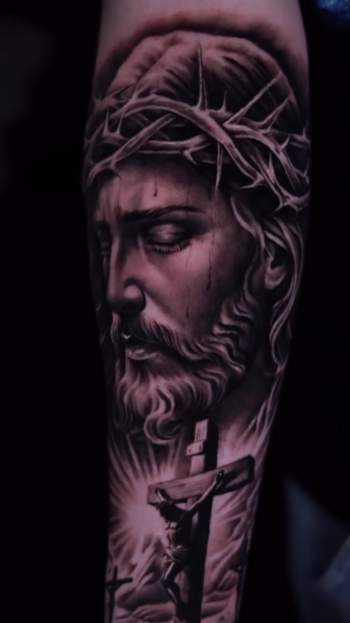 Jesus Christ on the cross realism tattoo by Anthony Maya