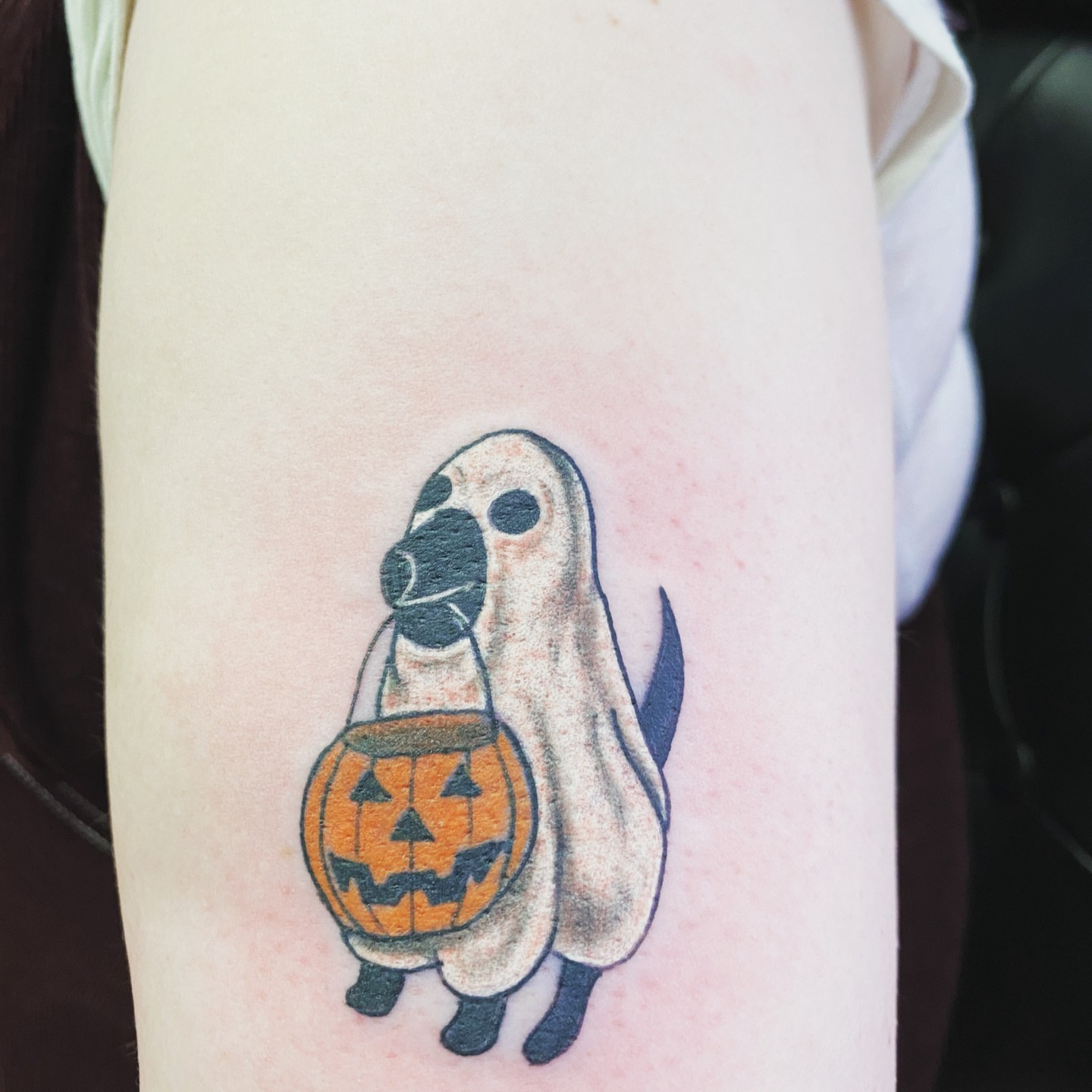 Ghost with jack-o'-lantern dotwork tattoo on the forearm by @lady_raven_tattoo