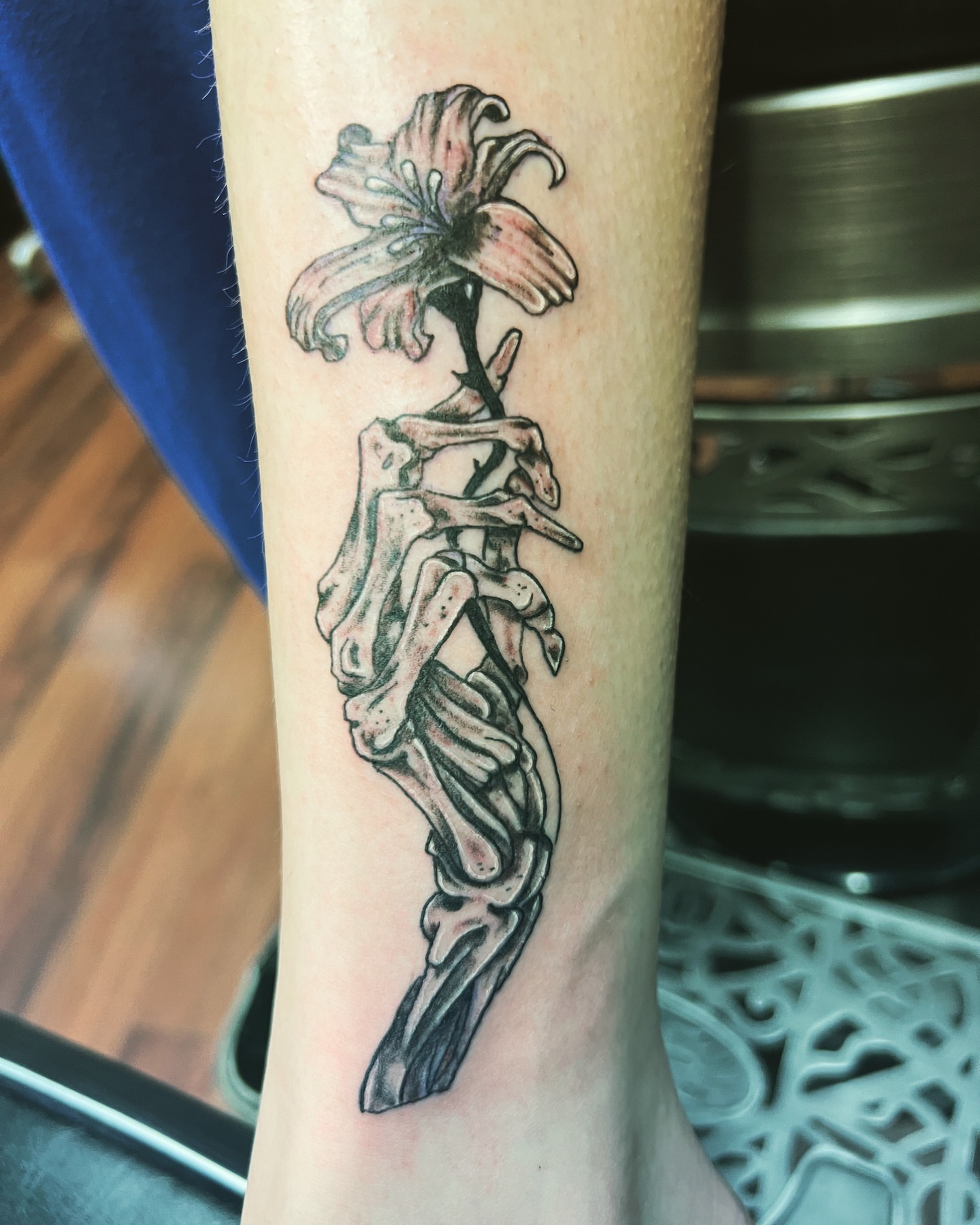 Flower skeleton black and grey tattoo on the forearm by @lady_raven_tattoo