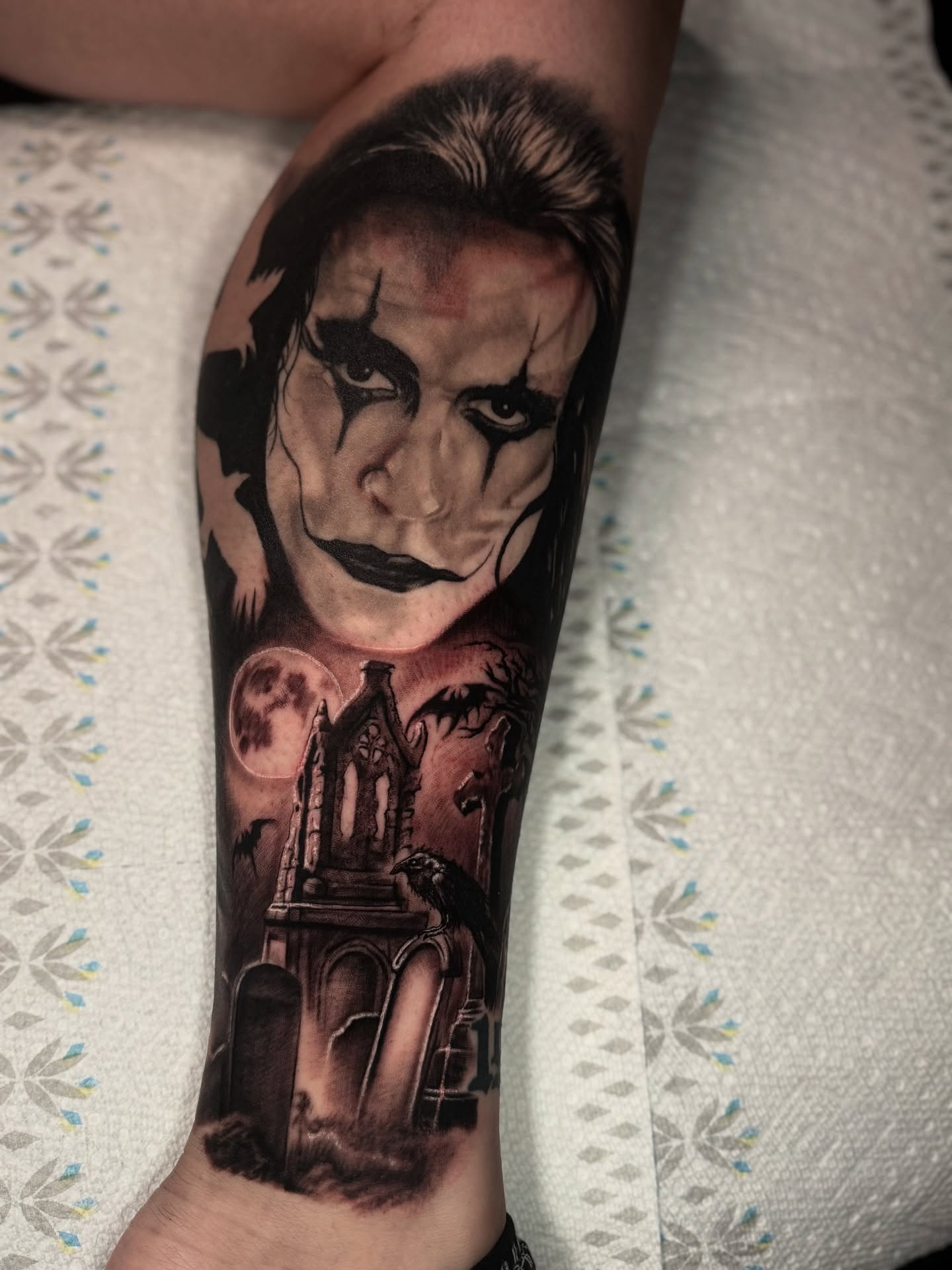 Gothic horror scene dark realism tattoo on the forearm by Isaac