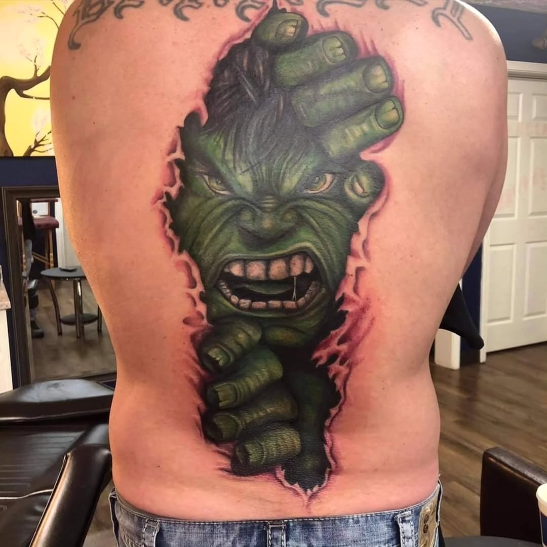 The Hulk breaking through skin realism tattoo on the back by DL Tats, Cape Girardeau, Missouri
