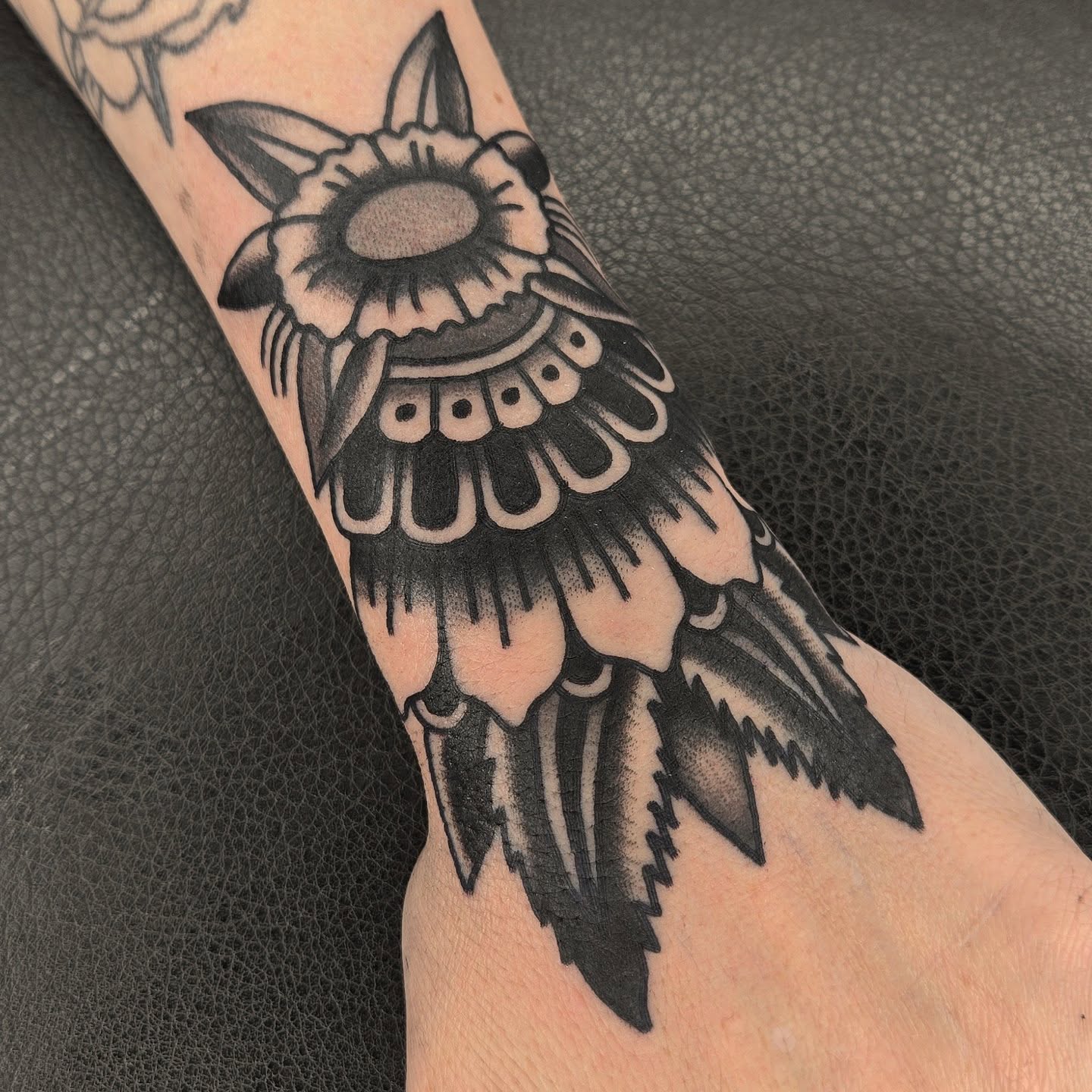 Bird American traditional tattoo on the forearm by Deke Harms, Bend, Oregon