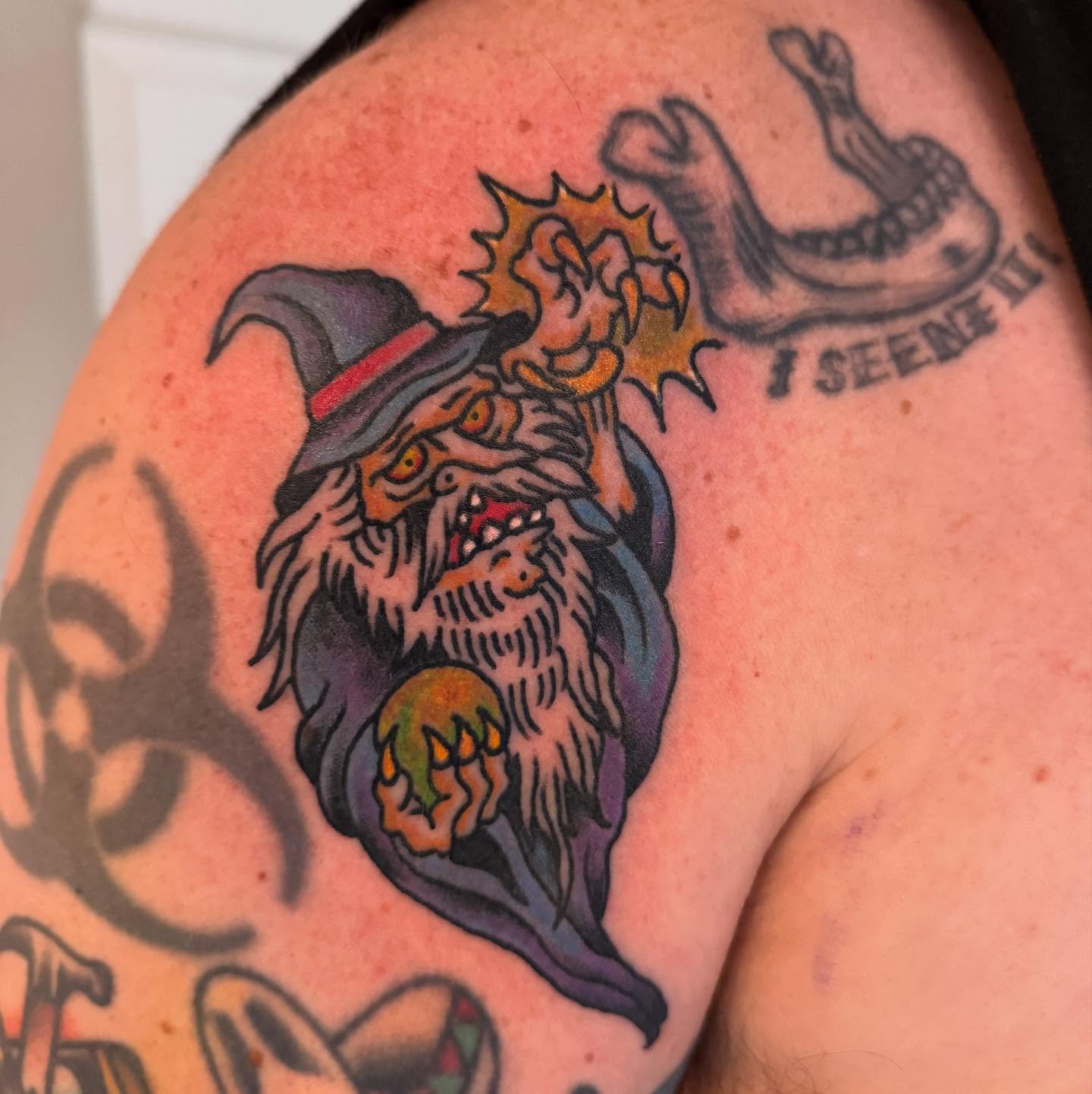 Wizard American traditional tattoo on the shoulder by Joe Truck