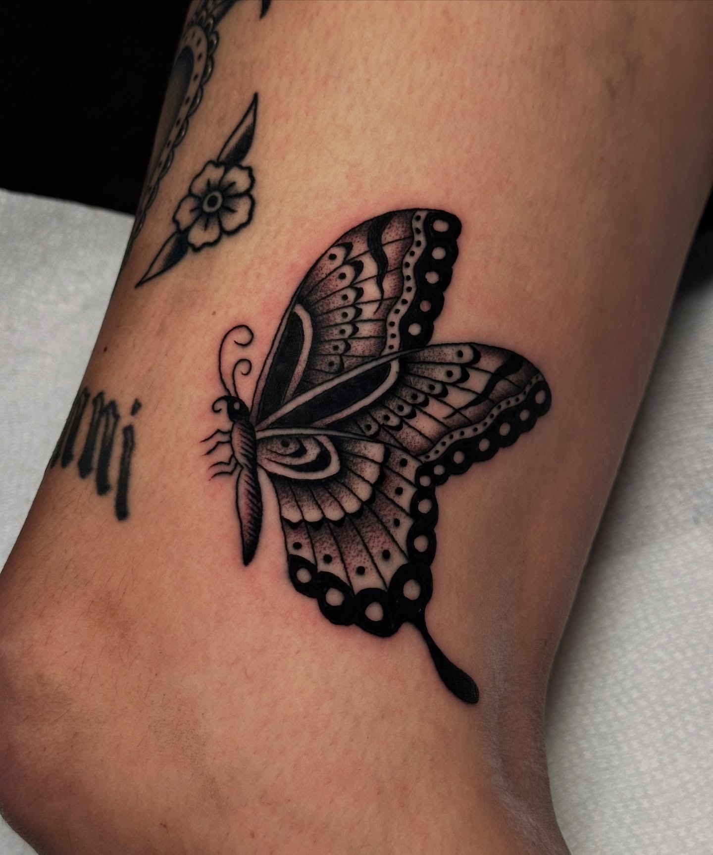 Butterfly black and grey tattoo on the forearm by Matthew, Georgetown, Texas