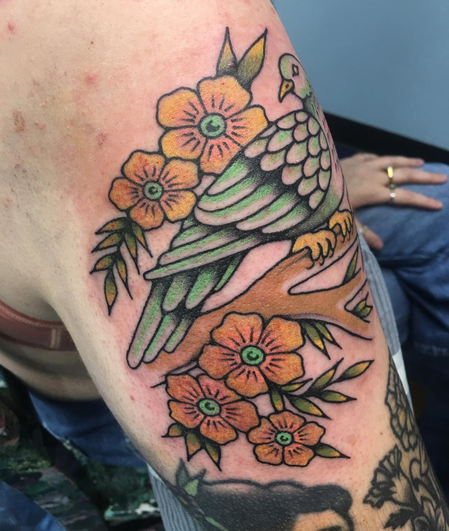 Bird and flowers American traditional tattoo on the forearm by Abbey Martin, Nashville, Tennessee