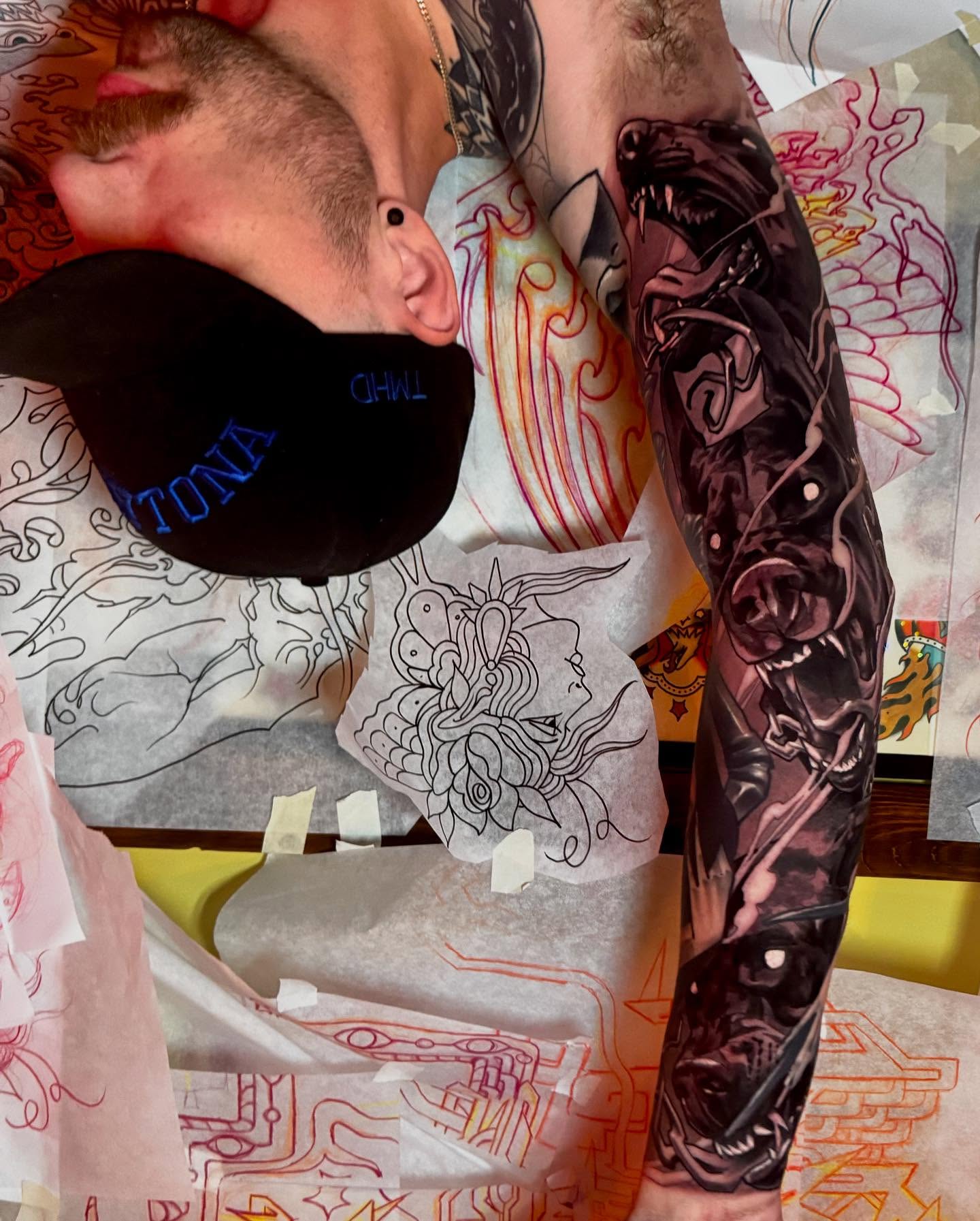Full sleeve dark realism tattoo on the upper arm by Sweets, Nashville, Tennessee
