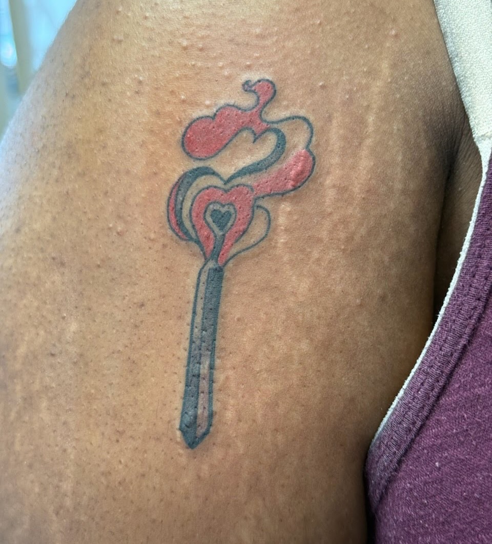Matchstick with heart American traditional tattoo on the upper arm by Kimberly Parton- Chapel Hill Tattooer, Chapel Hill, North Carolina