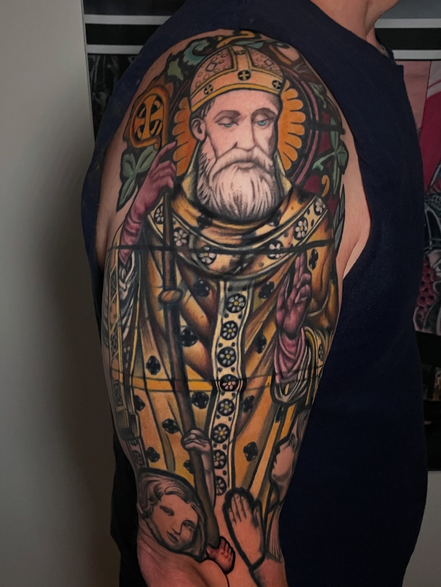 Religious figure American traditional tattoo on the upper arm by Kimberly Parton- Chapel Hill Tattooer, Chapel Hill, North Carolina