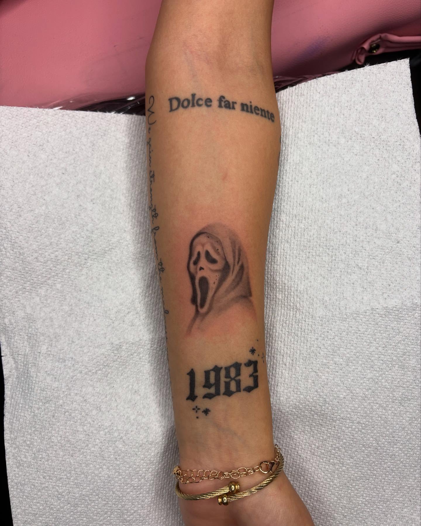 Scream ghost mask realism tattoo on the forearm by kylie