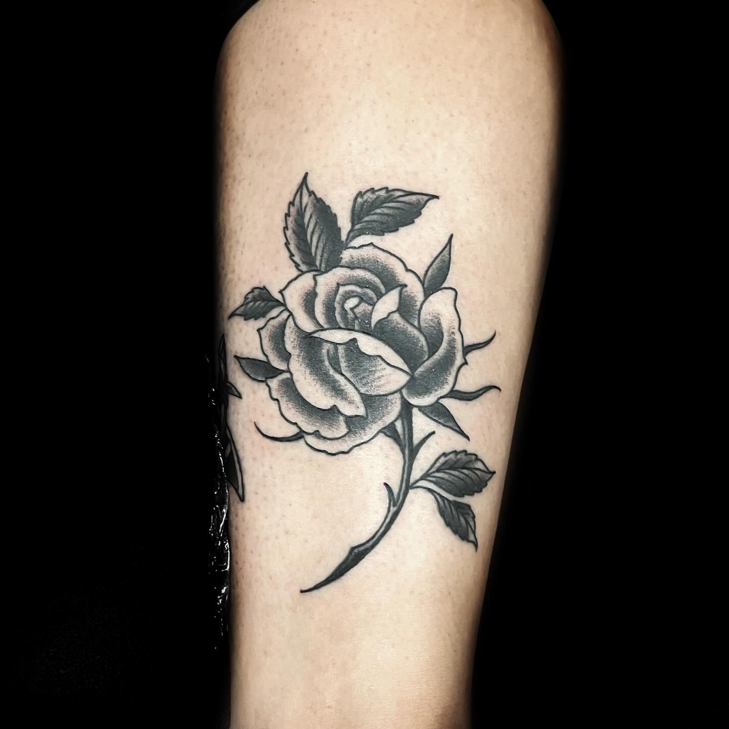 Rose black and grey tattoo on the forearm by @sloanxkettering