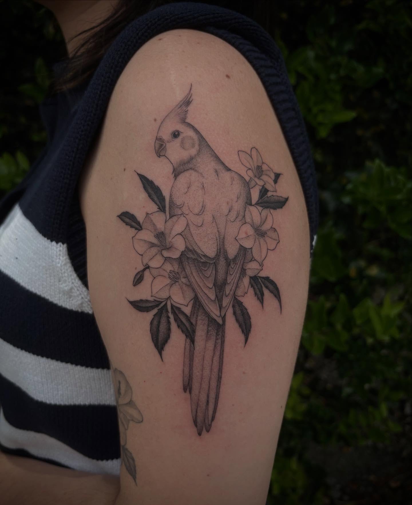 Parrot and flowers realism tattoo on the shoulder by Miami Tattoo Artist π Mel Carrasco