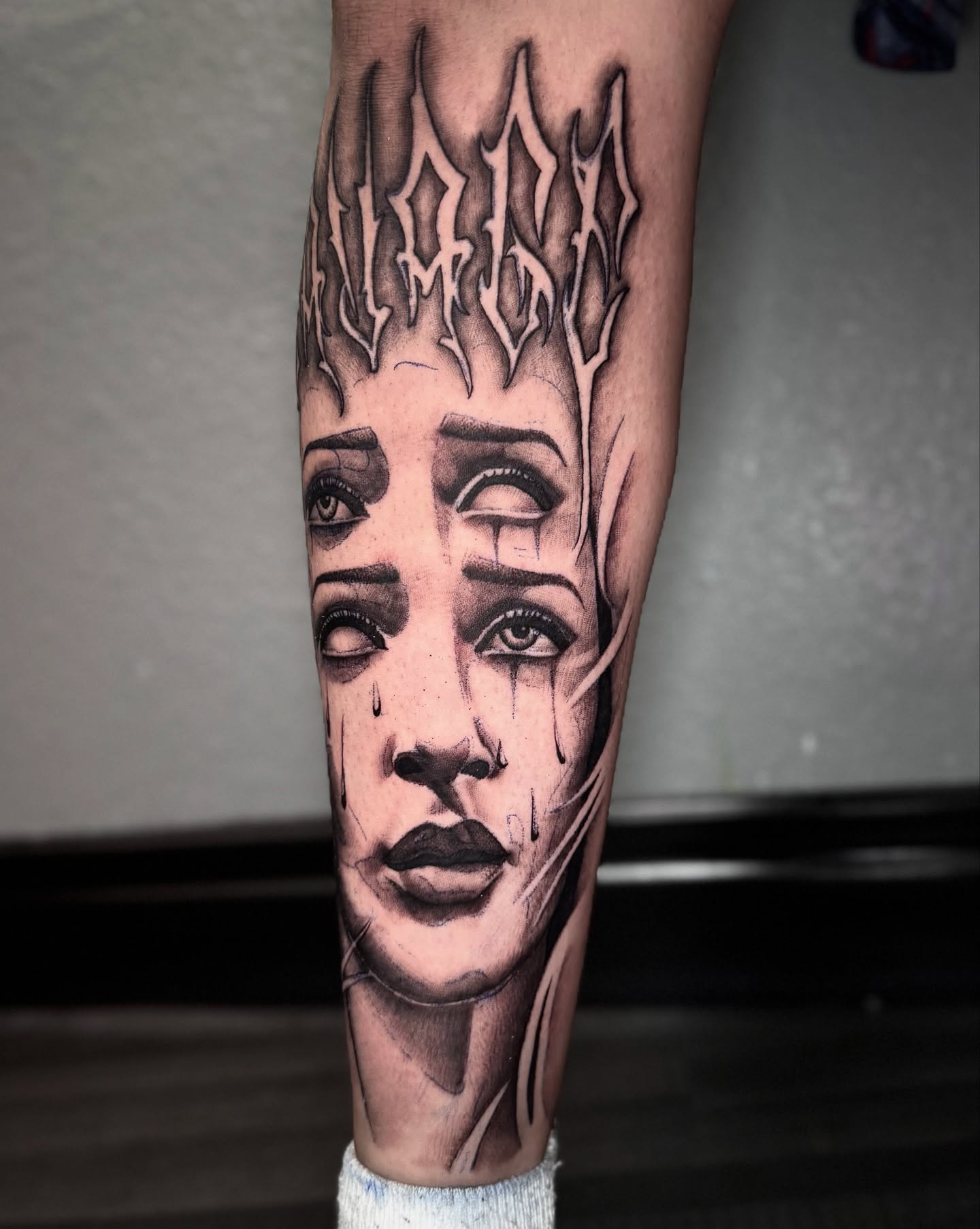 Woman's face realism tattoo on the forearm by Jess