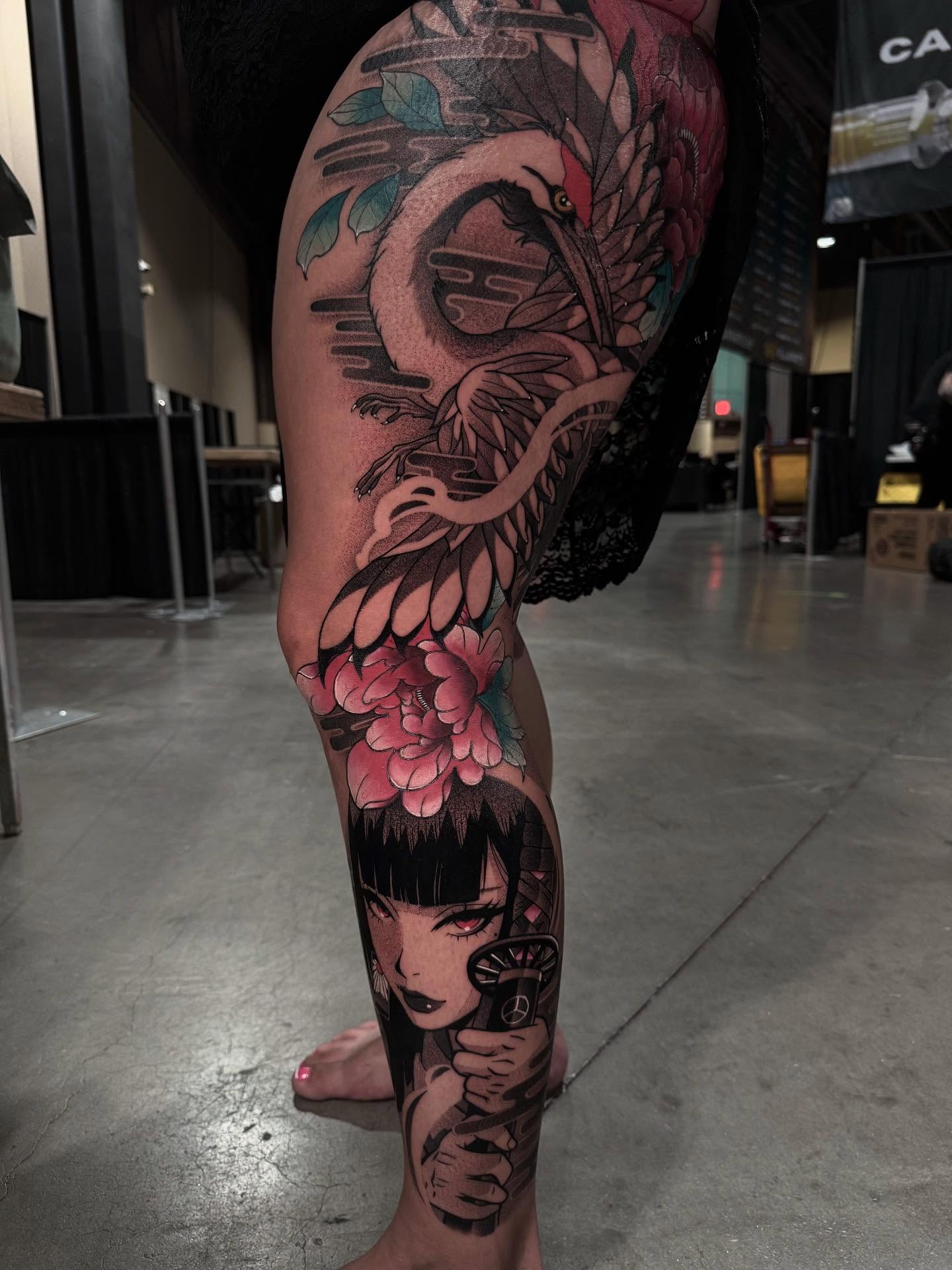 Geisha with snake and flowers japanese irezumi tattoo on the calf by Anthony D. Rustik