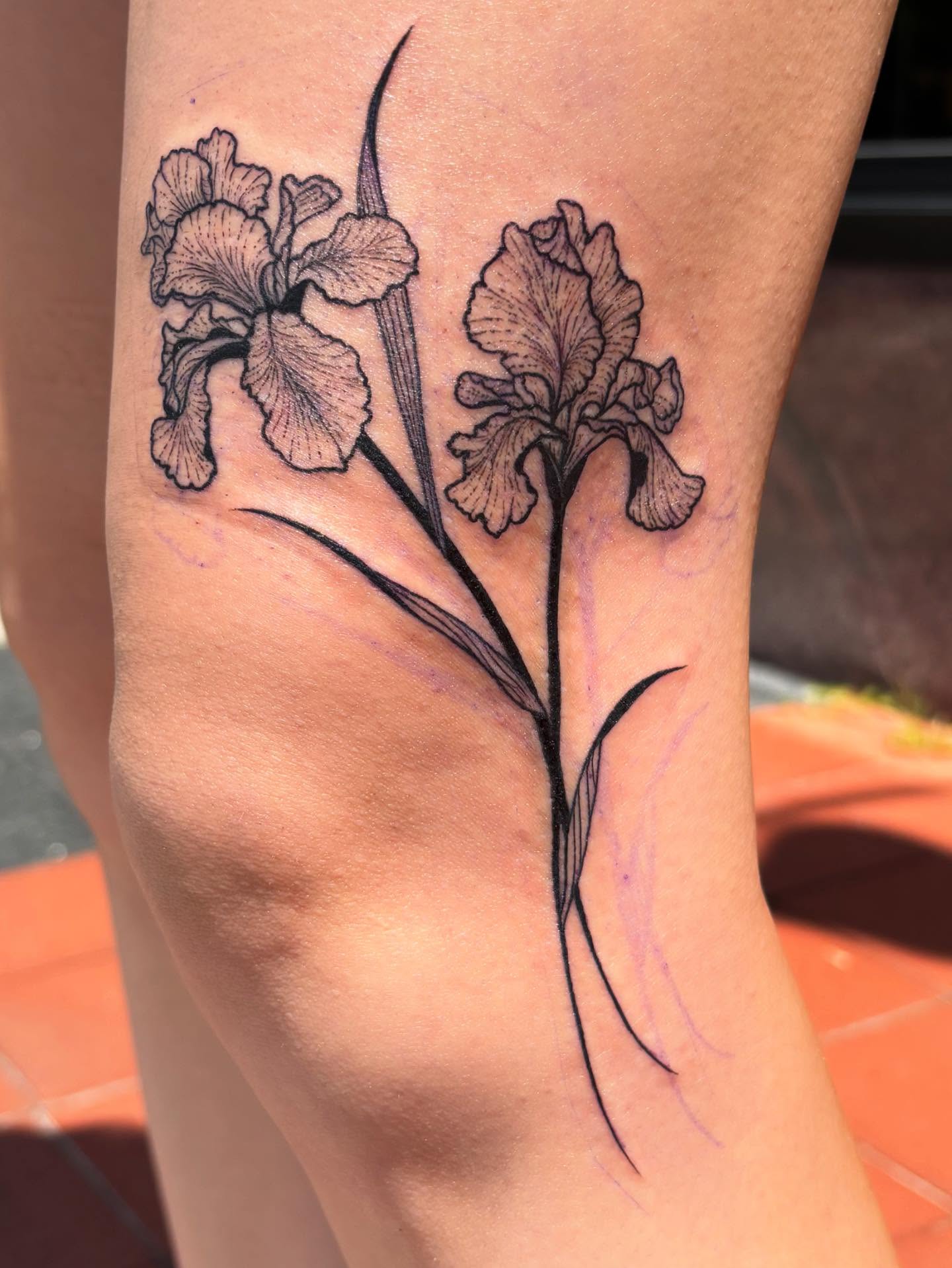 Iris flowers black and grey tattoo on the forearm by Anna Kathleen, Des Moines, Iowa