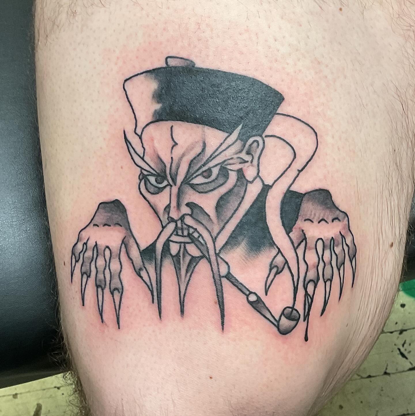 Demon dark realism tattoo on the thigh by Roachrude
