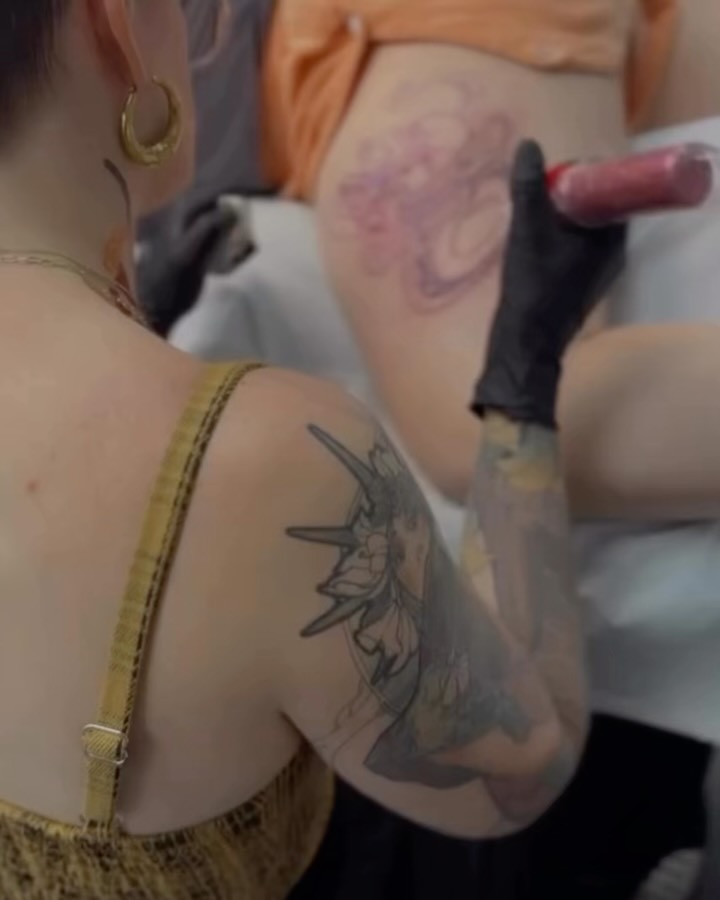 Anime character anime tattoo on the upper arm by Alyssa Shirkey