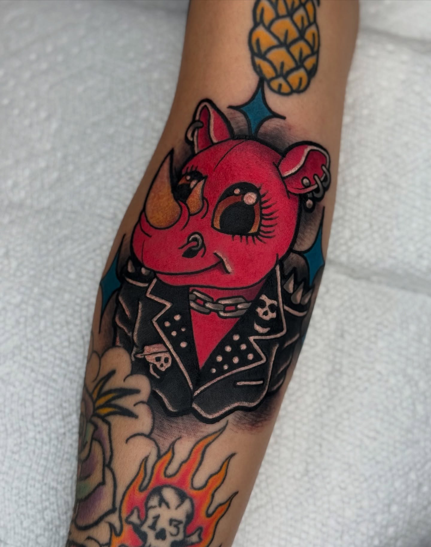 Rhino in biker jacket American traditional tattoo on the forearm by T Dubs ✏️